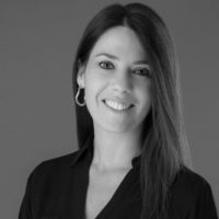 Black and white photo of consultant Lia Eleopoulos