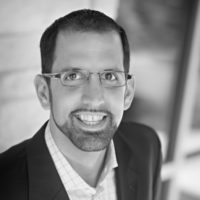 Black and white photo of consultant Josh Mueller