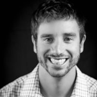 Black and white photo of consultant Adam Conroy