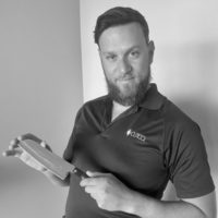 Black and white photo of consultant Joshua Rasizer