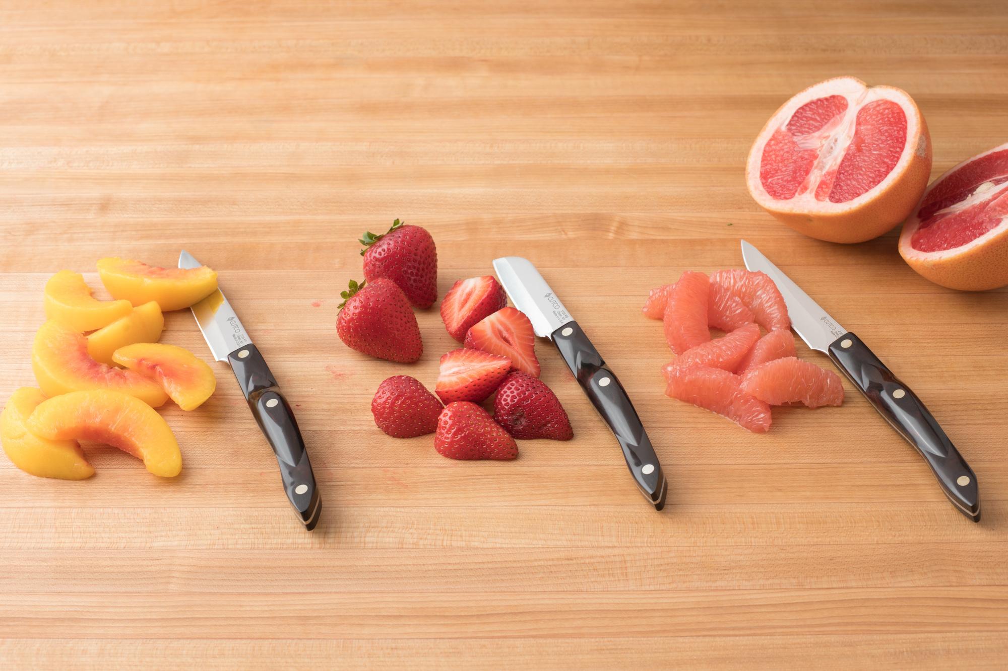 paring knives with fruit