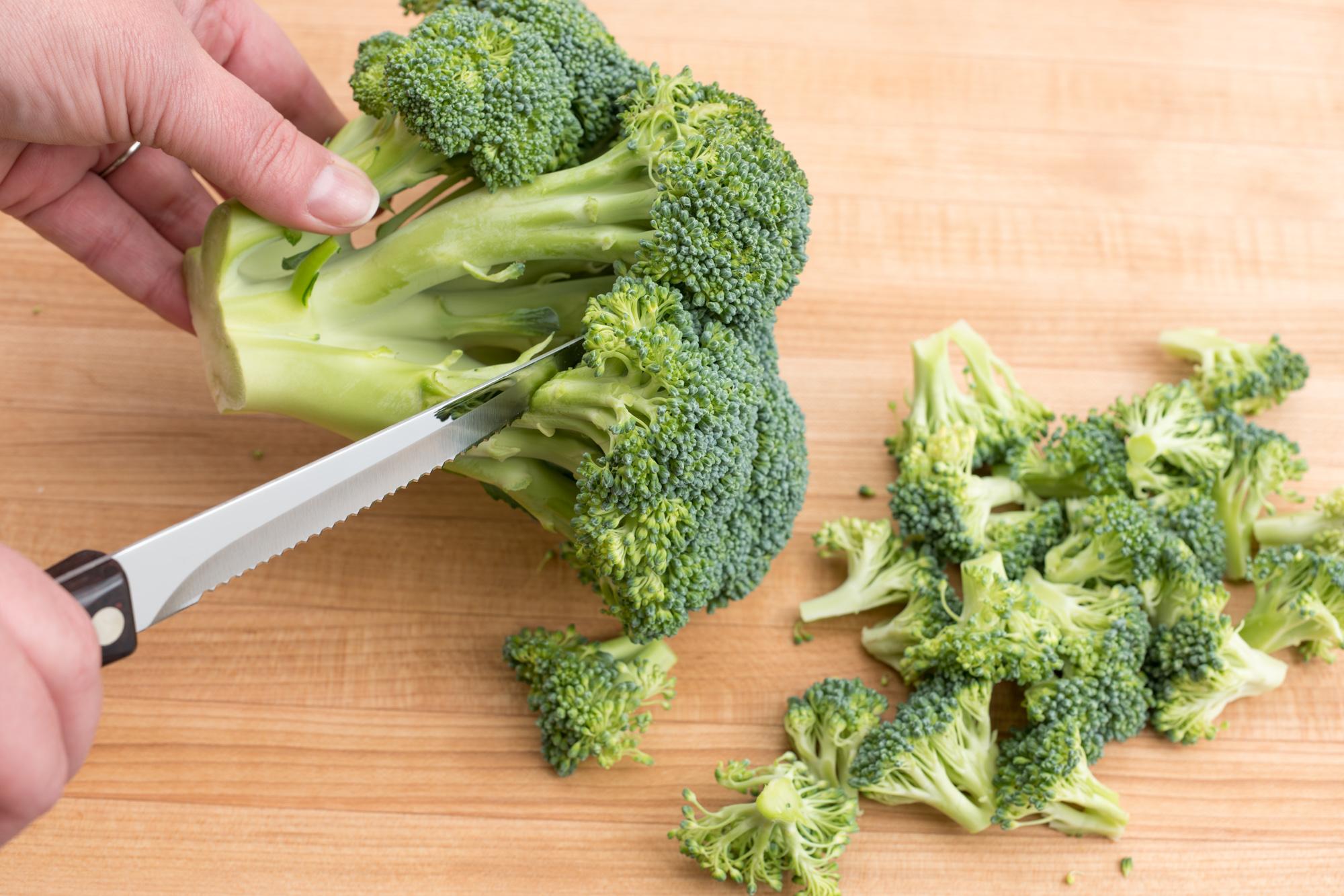 Trimming the broccoli with a Trimmer.