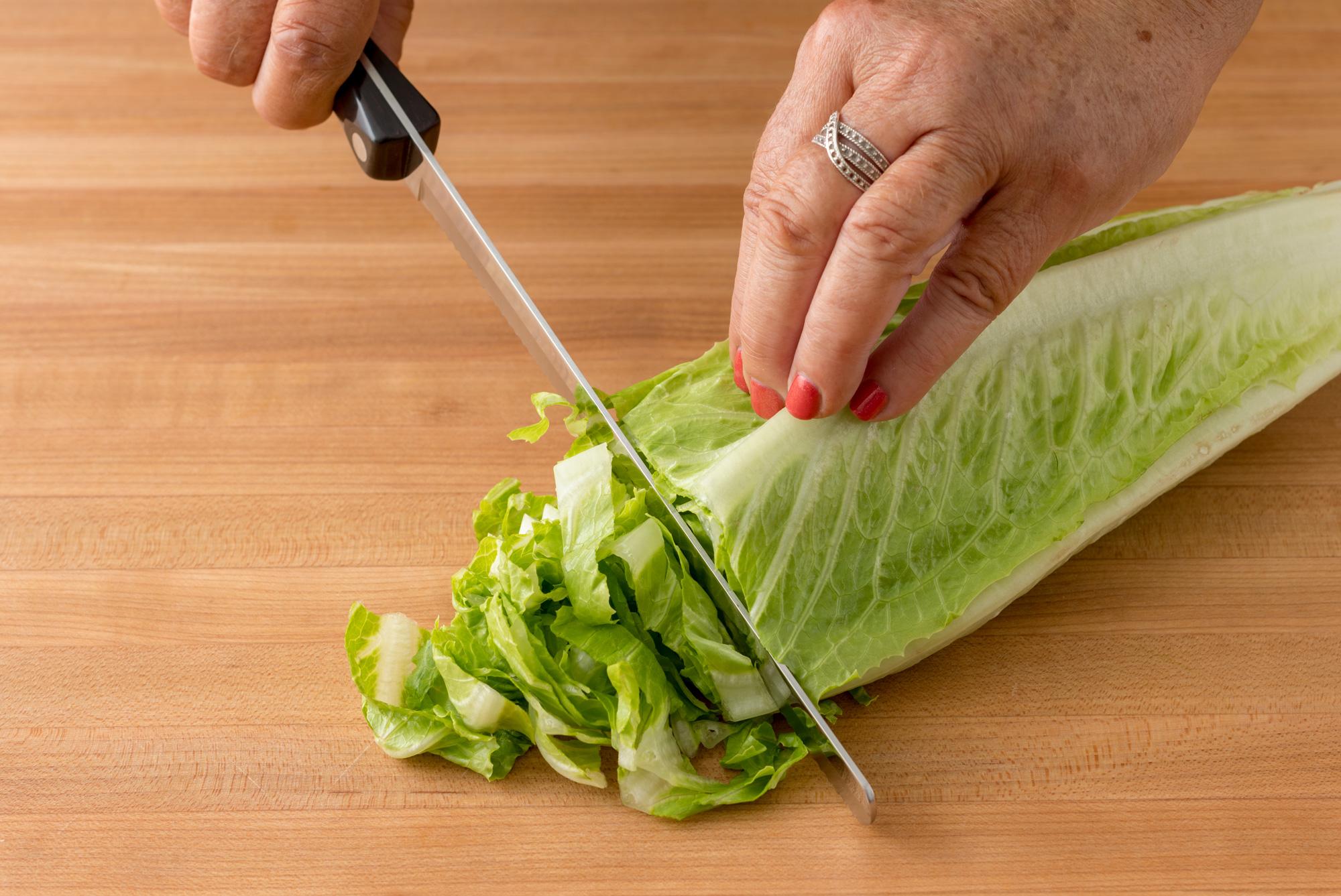 Shredding the romaine lettuce with a Petite Slicer.