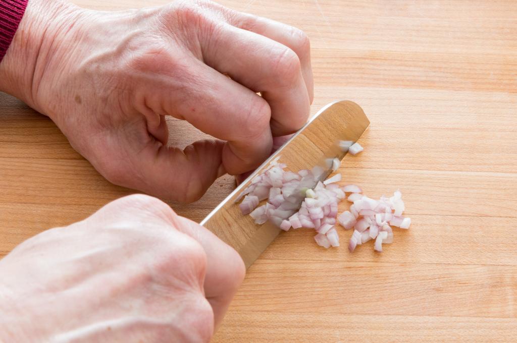 Mincing shallot with a Petite Santoku.