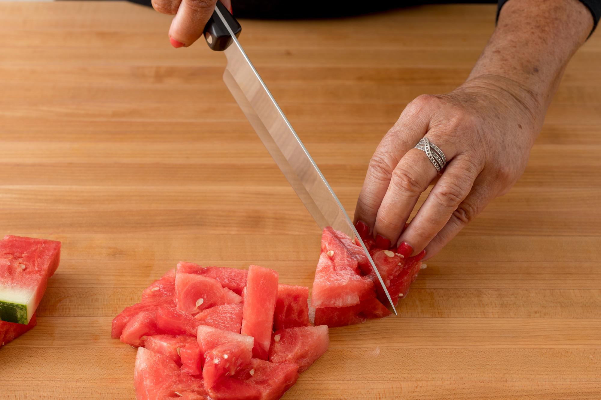 Cubing the watermelon with a Petite Chef.