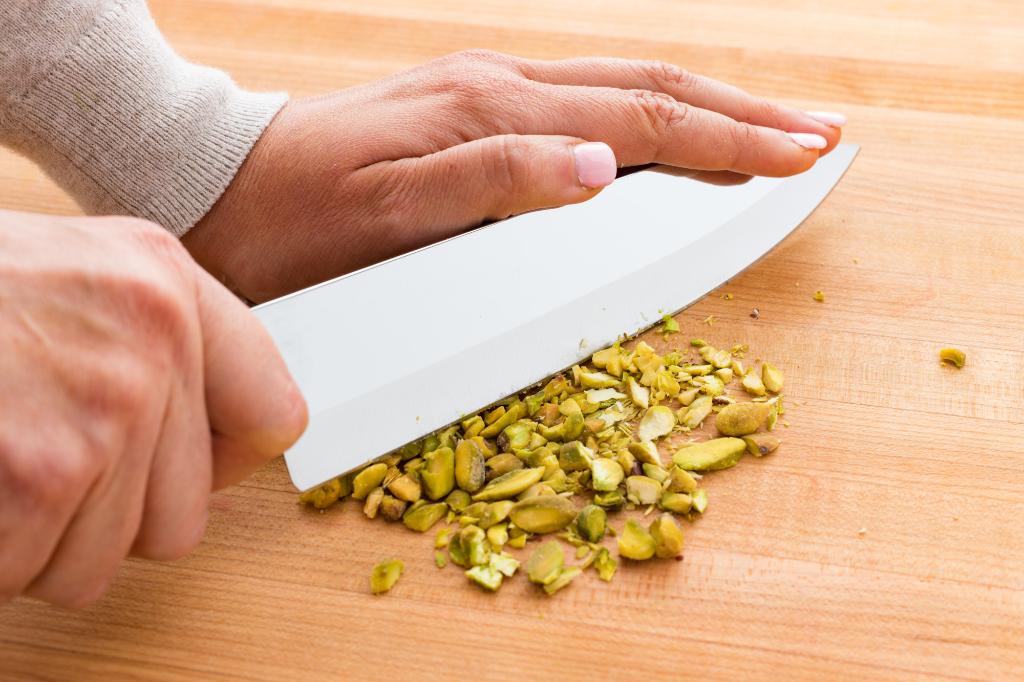 Using a Petite Chef to chop the pistachios.