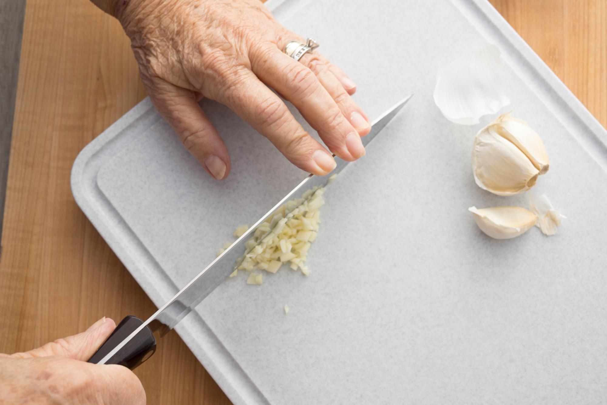 Mincing the garlic with a Petite Chef.