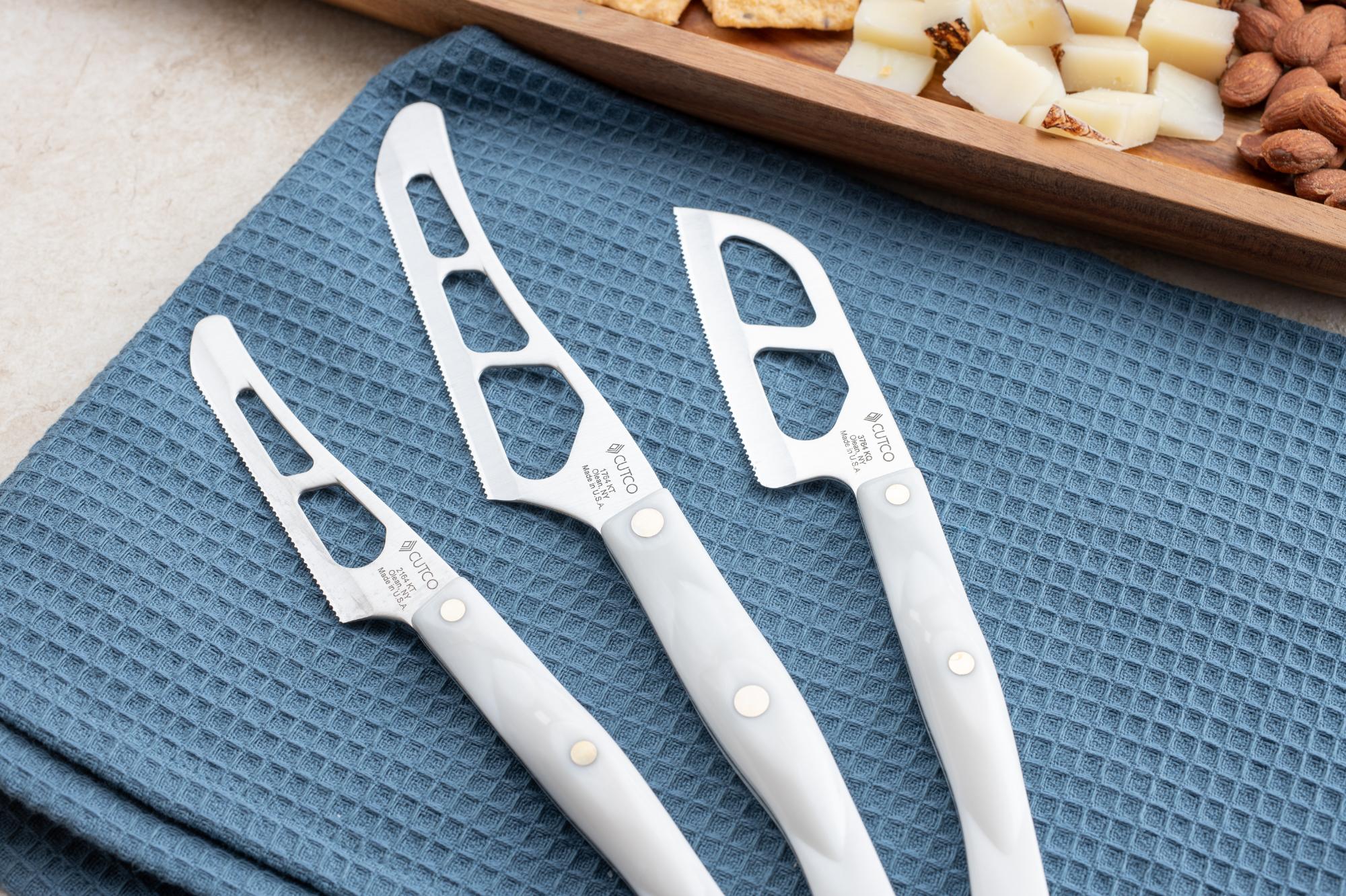 Cheese knives laid out.