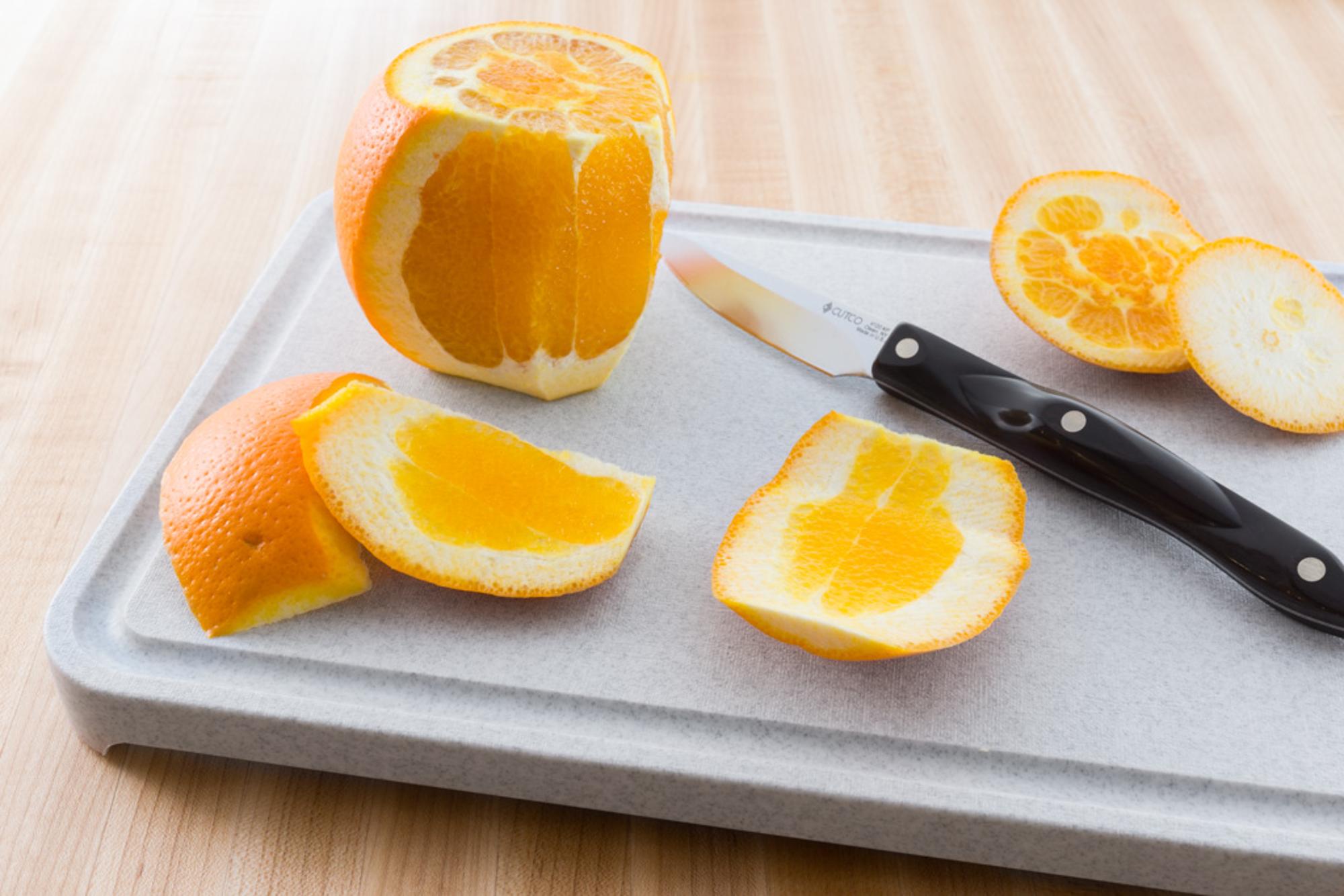 Cut orange rind with a Gourmet Paring Knife.