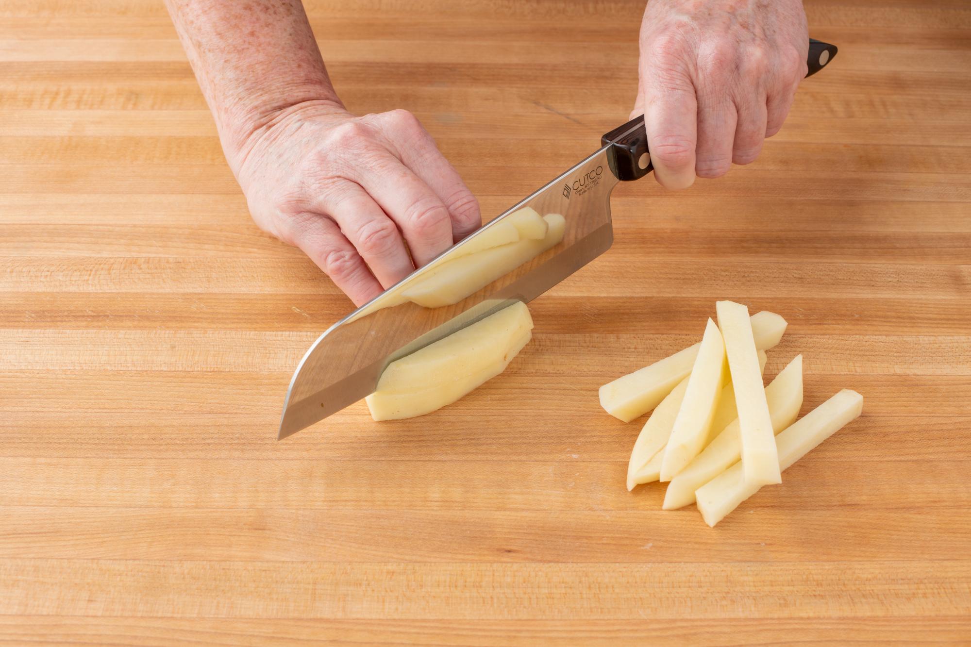 Cutting the potato with the Petite Santoku.