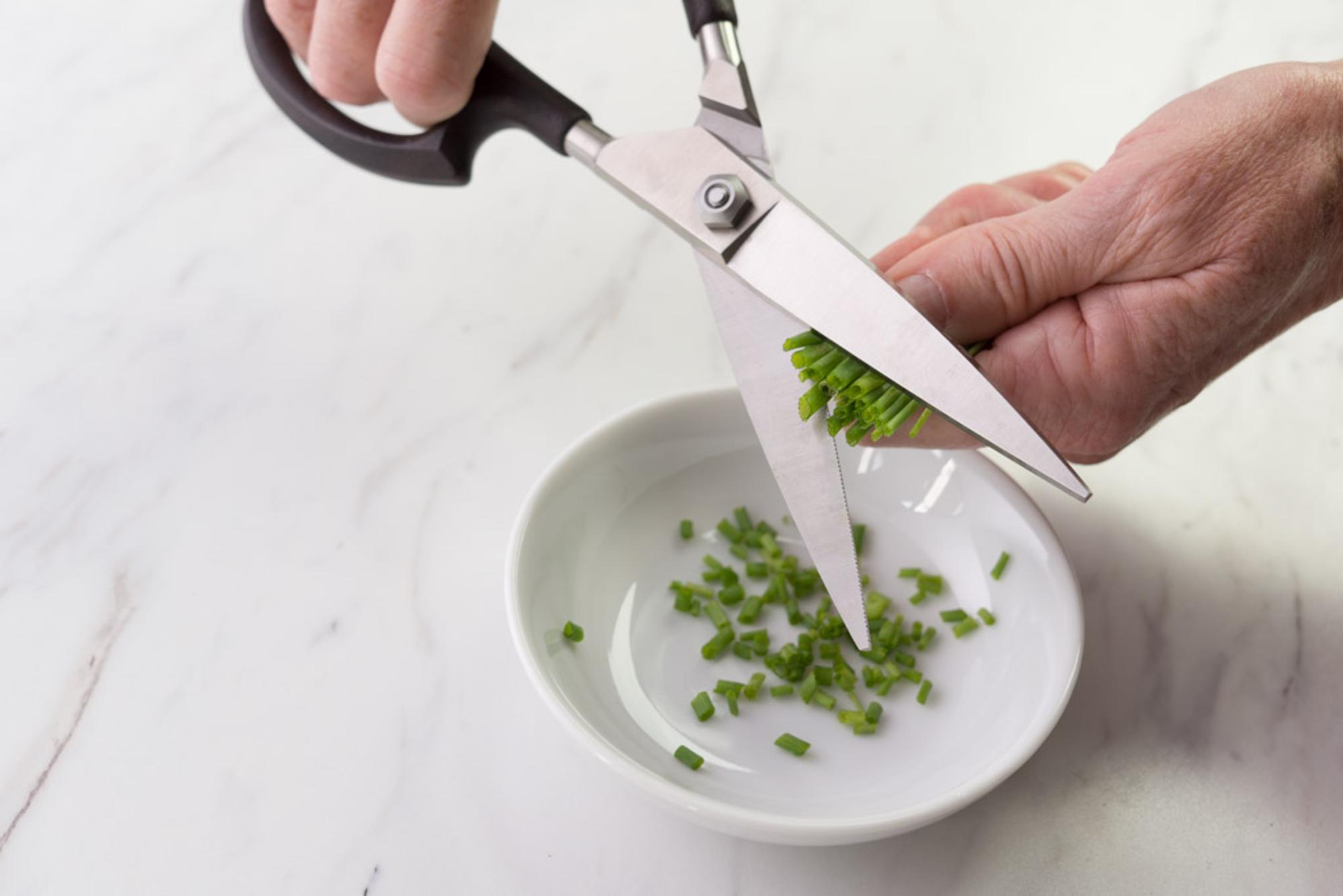 Snipping the chives with the Super Shears.