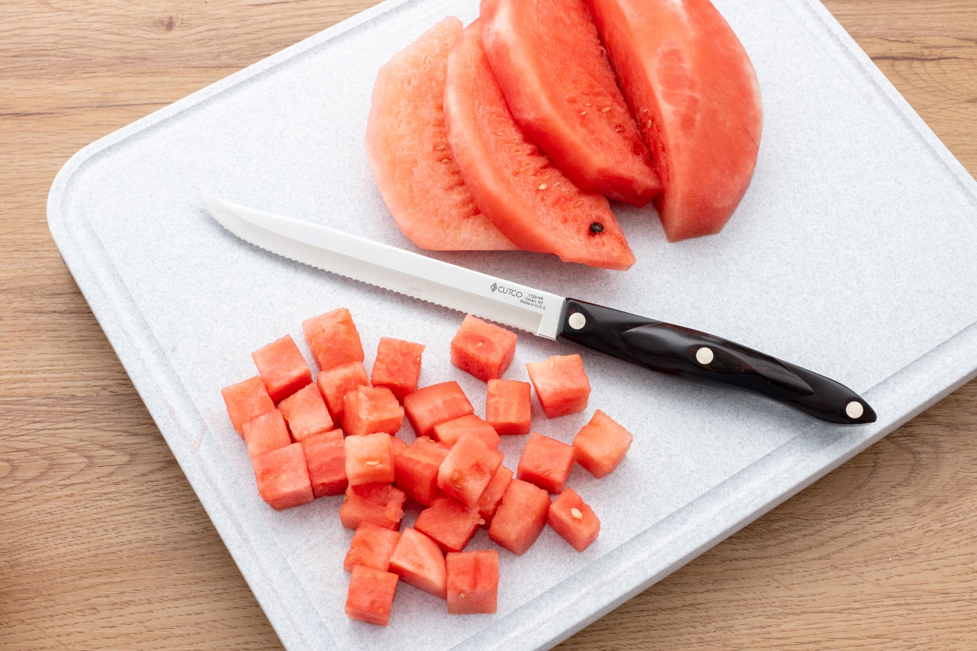 Petite Carver with cubed watermelon.