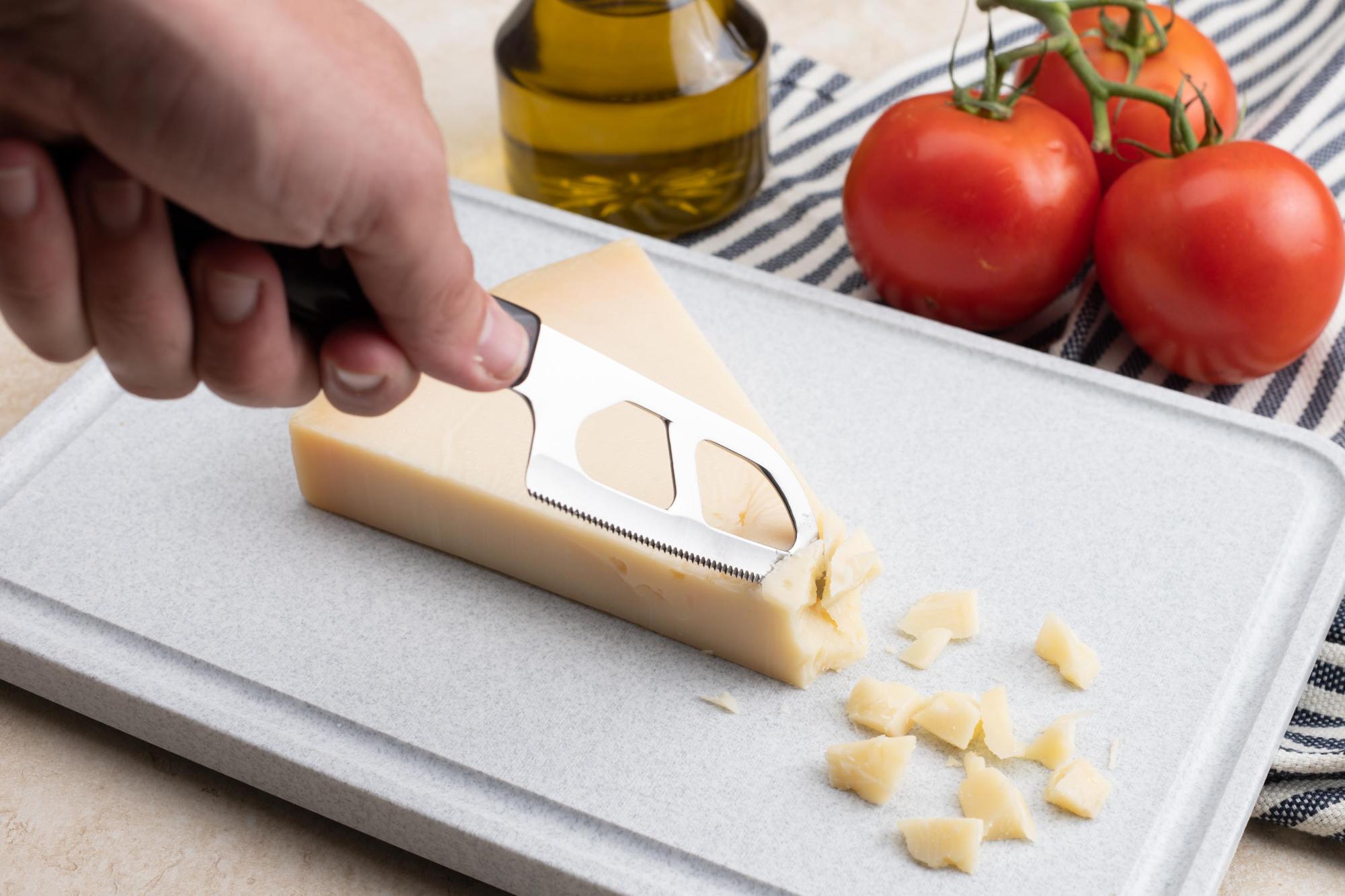 The Santoku-Style Cheese Knife chunks out hard cheese.