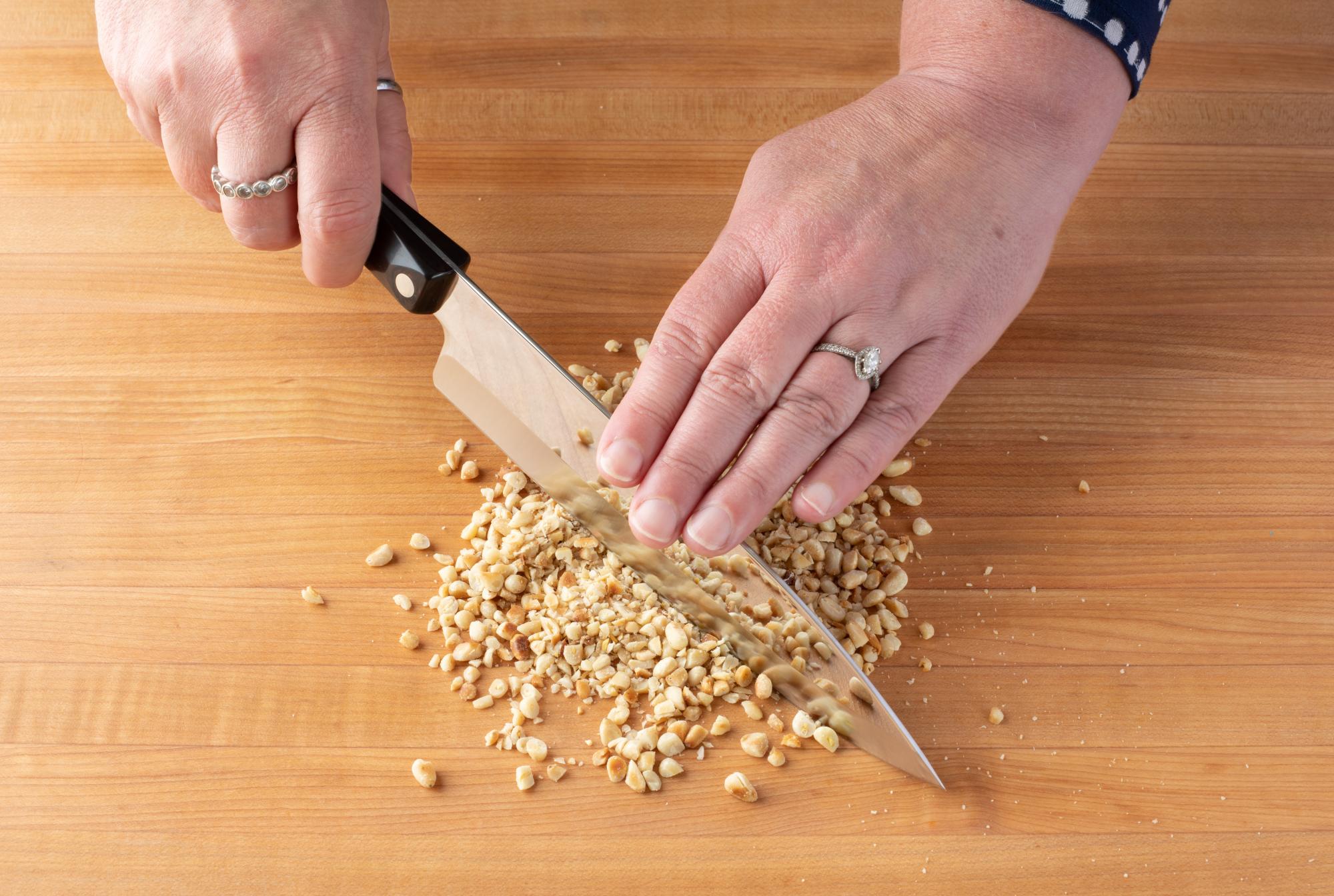 Chopping the pine nuts with a Petite Chef.