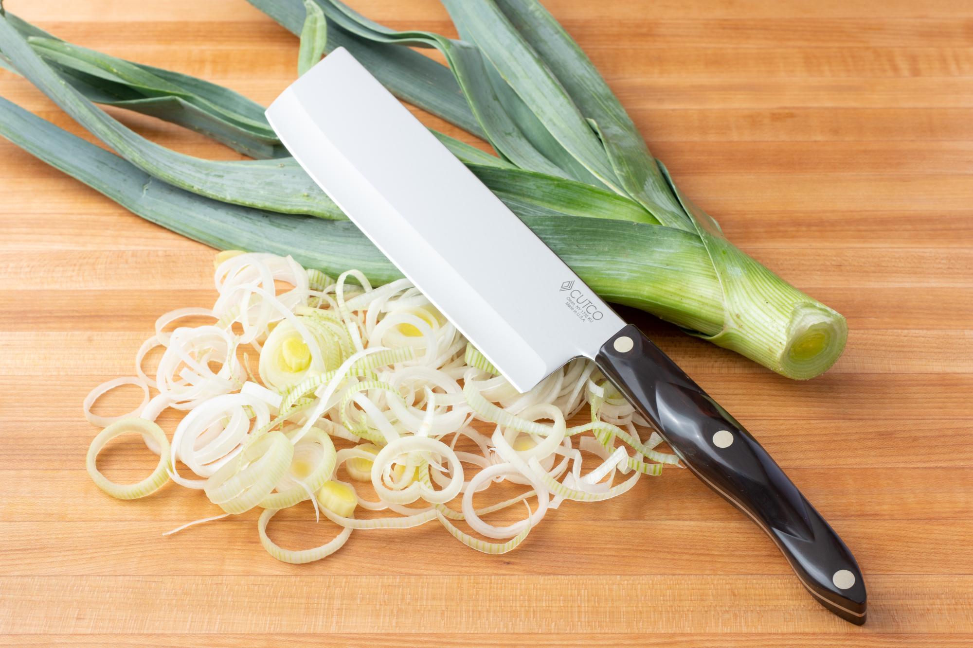 Using the Vegetable Knife to slice the leek.