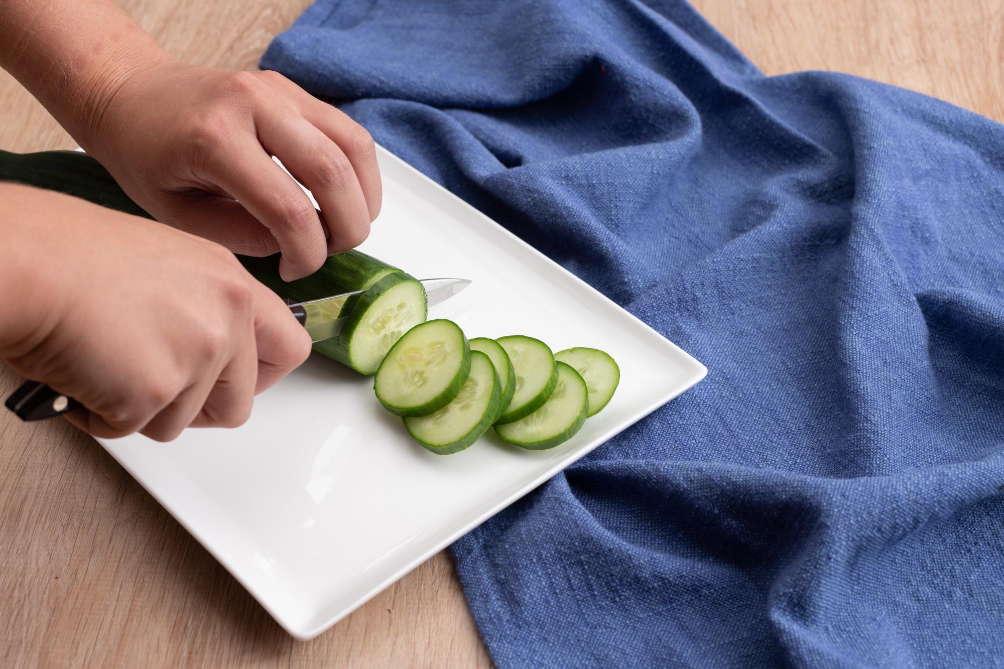 Cutting on a ceramic plate.