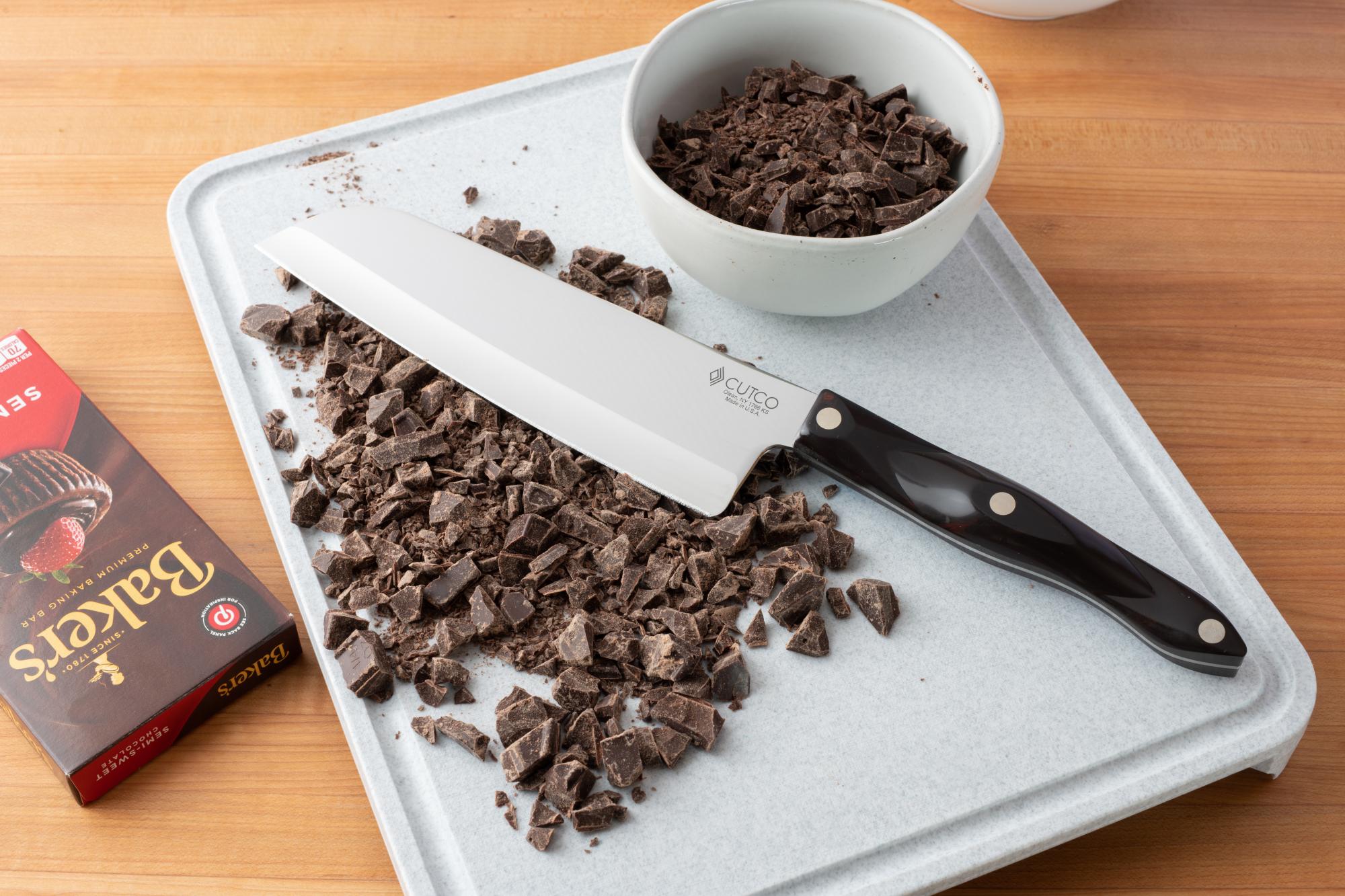Chopping the cacao with a Santoku.