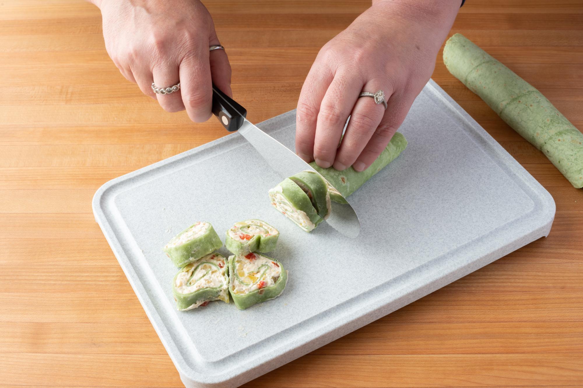 Slicing the rolls with a Spatula Spreader.