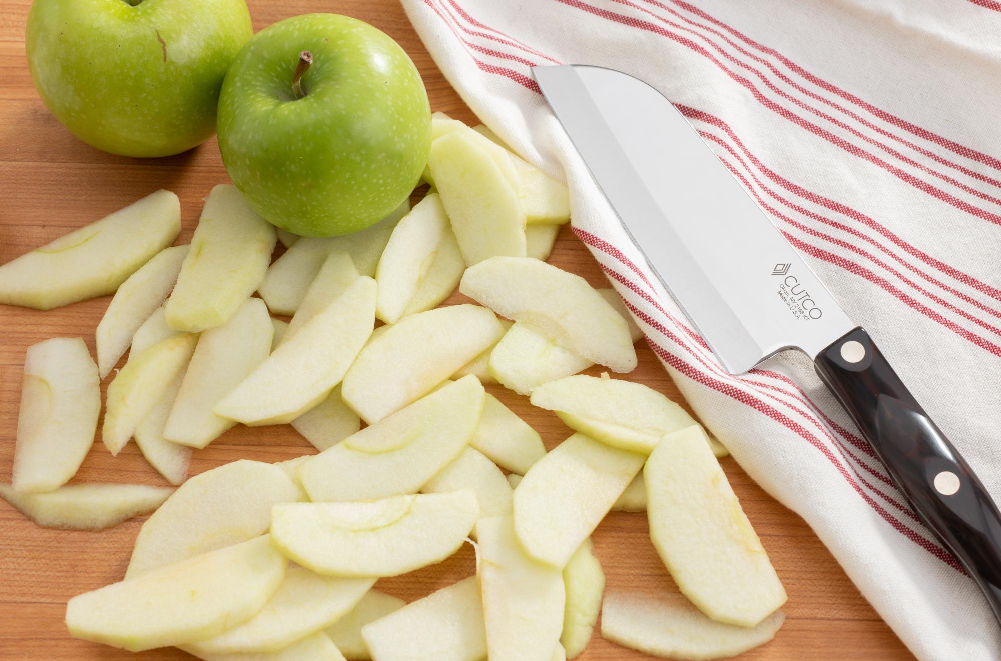 Sliced apples with a Petite Santoku.