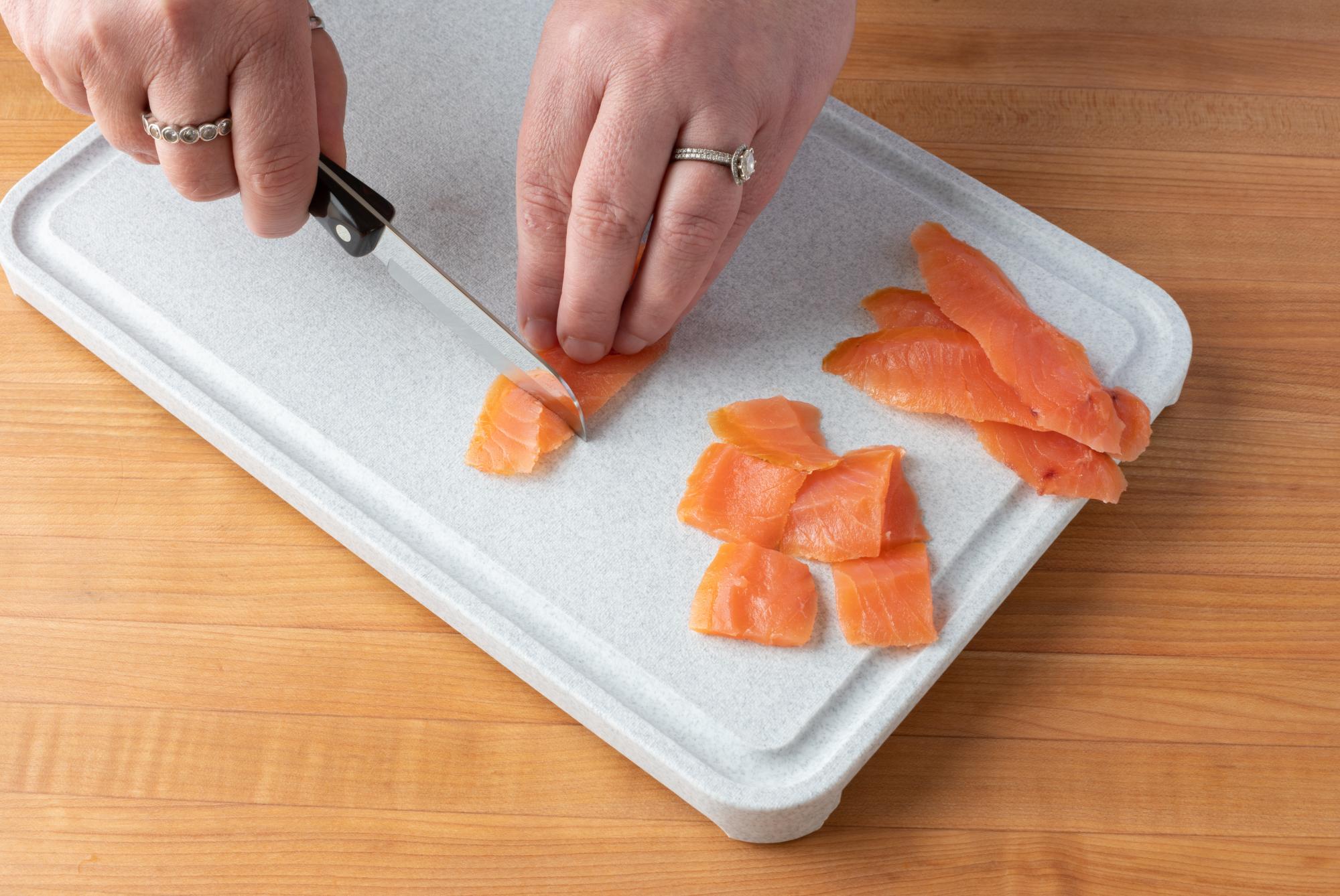 Cutting the smoked salmon with a Santoku-Style Paring Knife