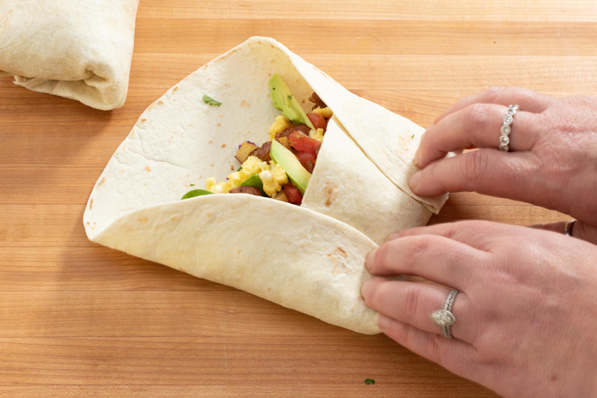 Folding up the burrito.