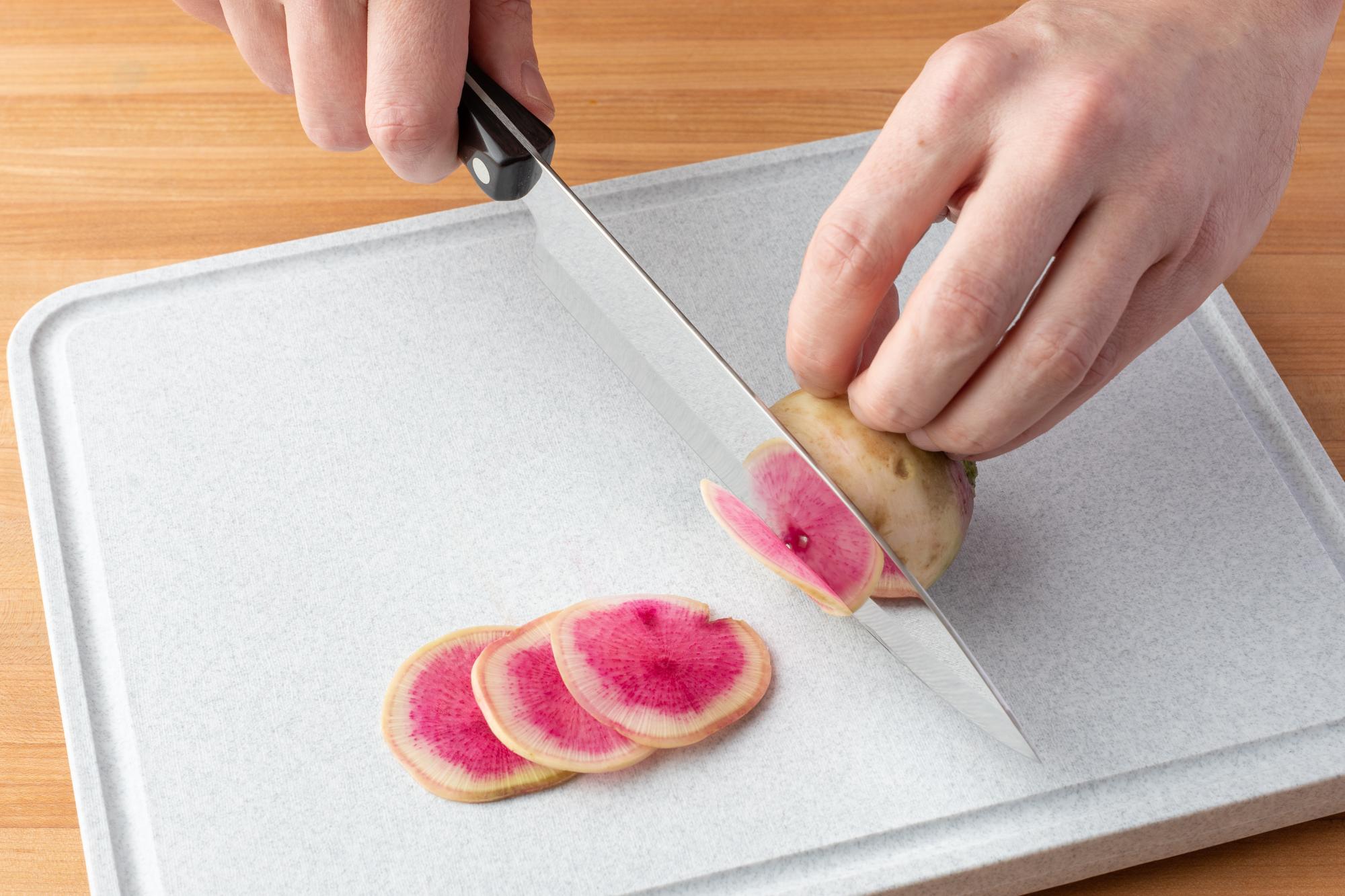 Thinly slice radishes with a Petite Chef.