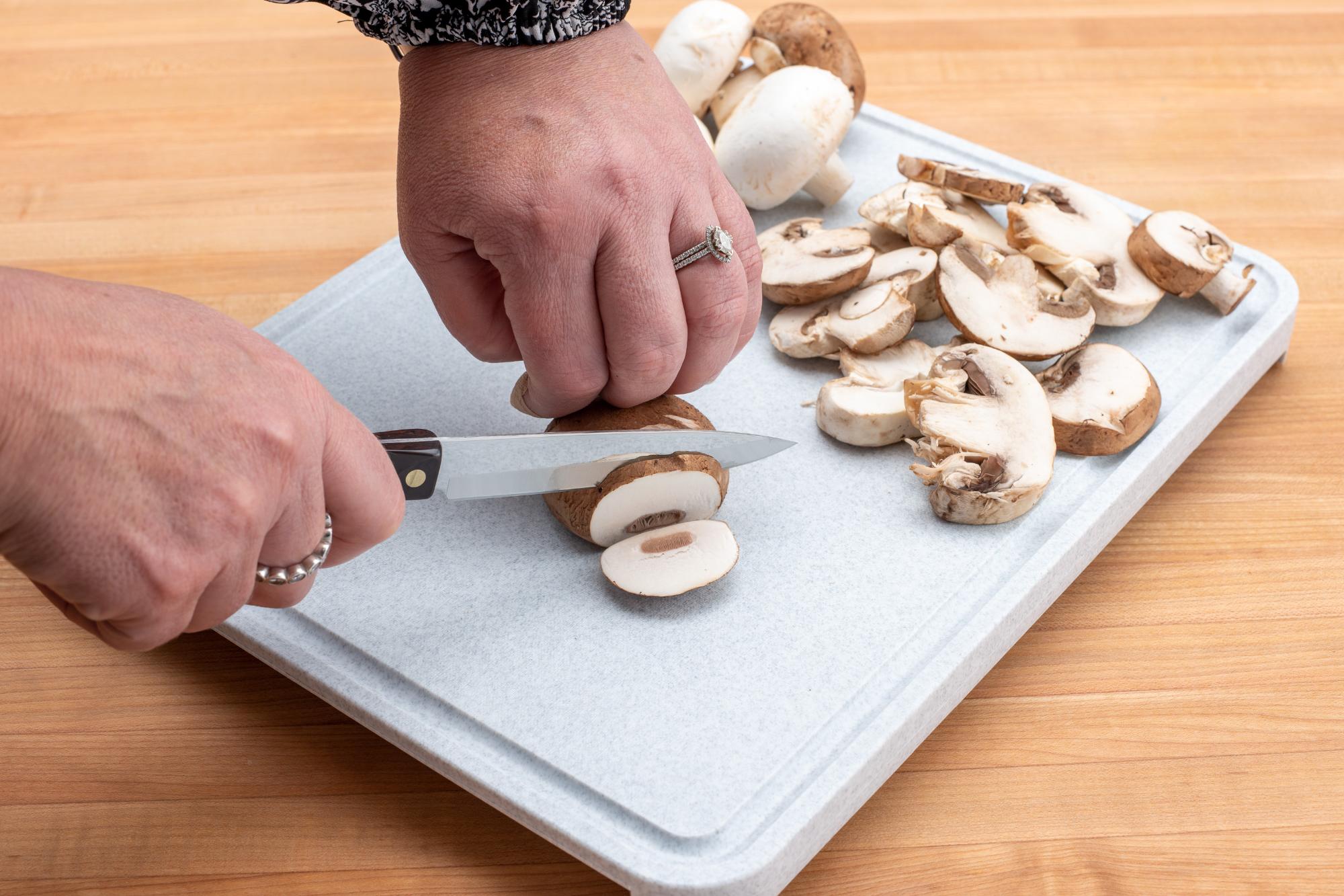 Prepping the mushrooms with a 4 Inch Paring Knife.