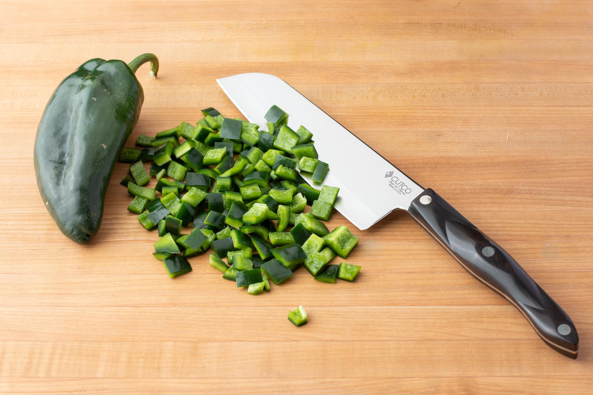 Diced pepper with a Petite Santoku.