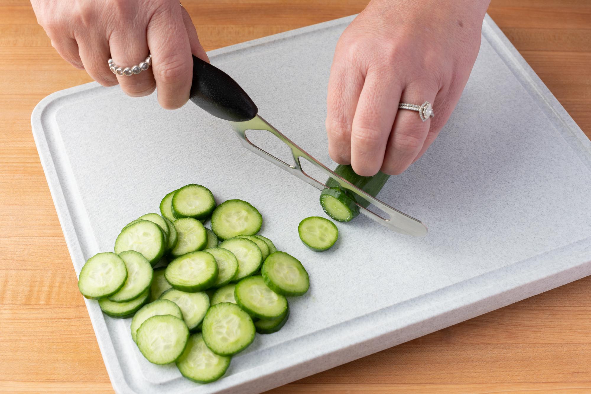 Slicing cucumber with a Cheese Knife.