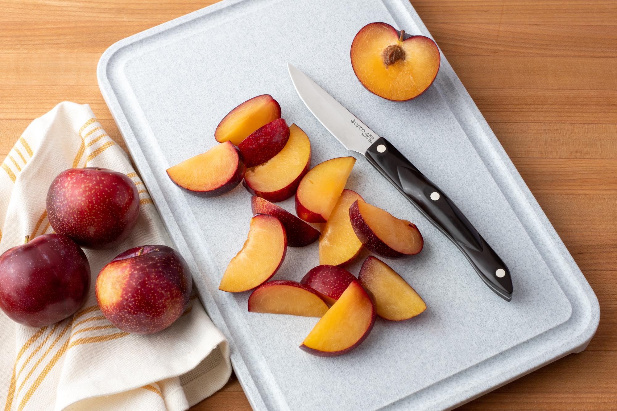 Sliced plums with the Gourmet Paring Knife.