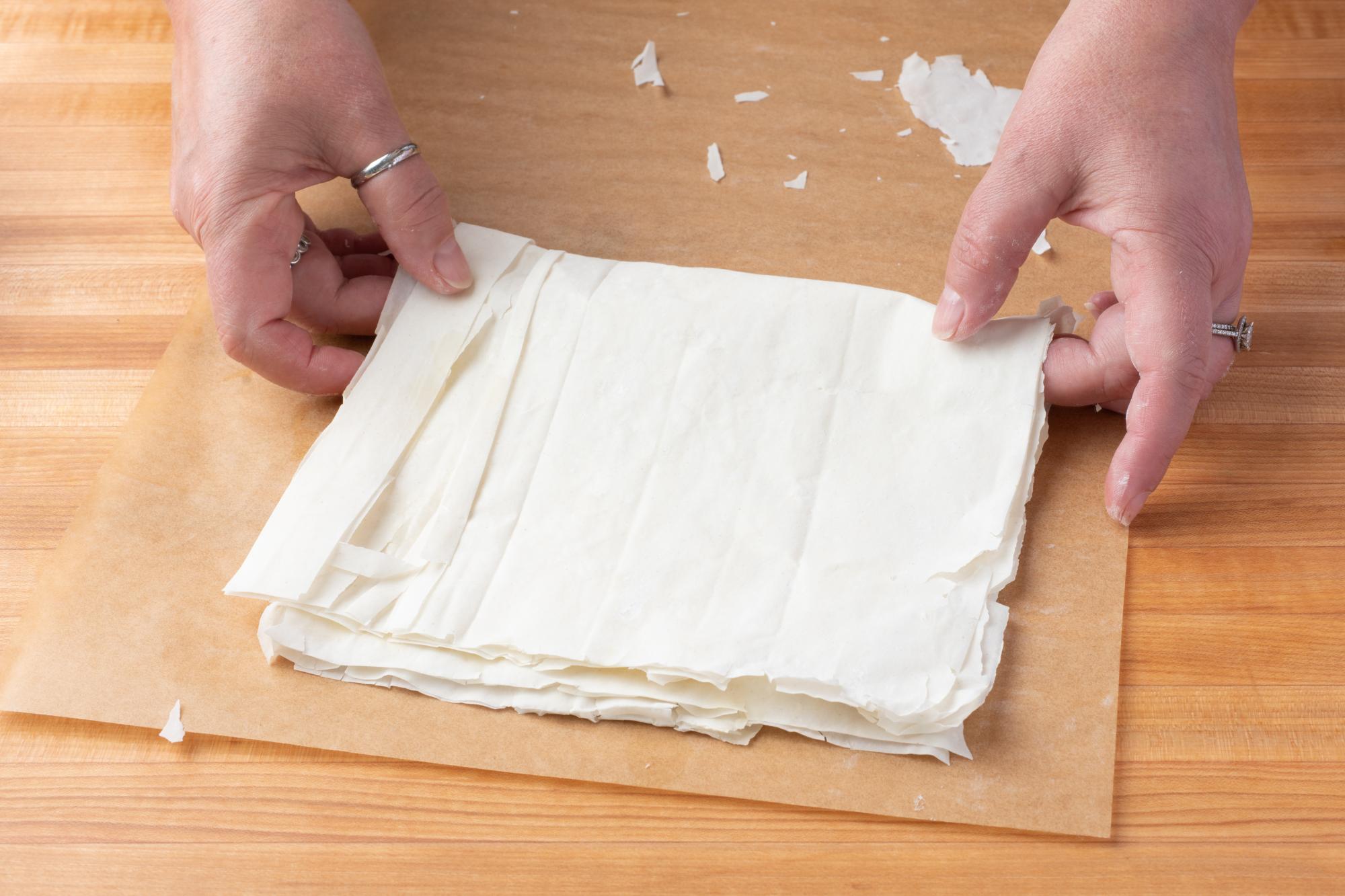 Folding the phyllo dough.