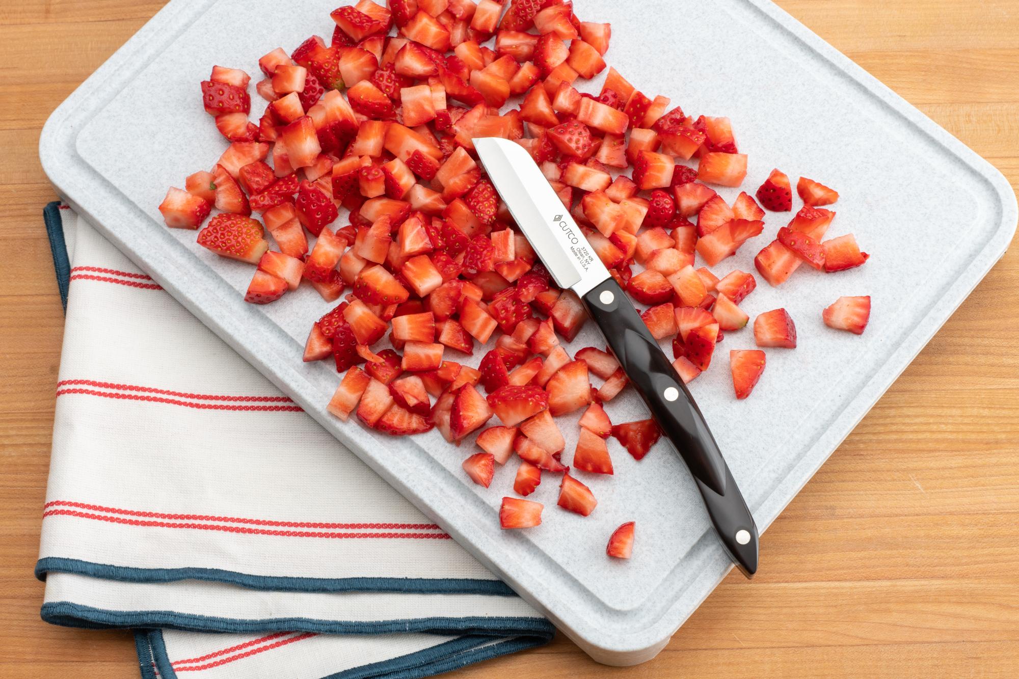 Diced strawberries with  a Santoku Style 3-Inch Paring Knife.