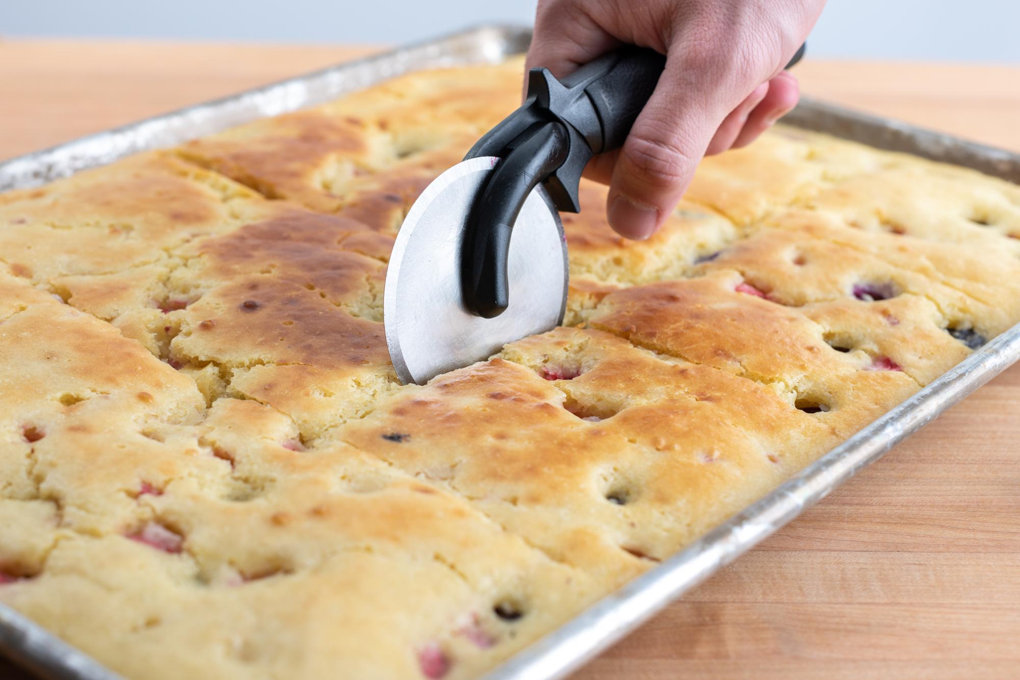 Cutting the pancakes into squares using the Pizza Cutter.