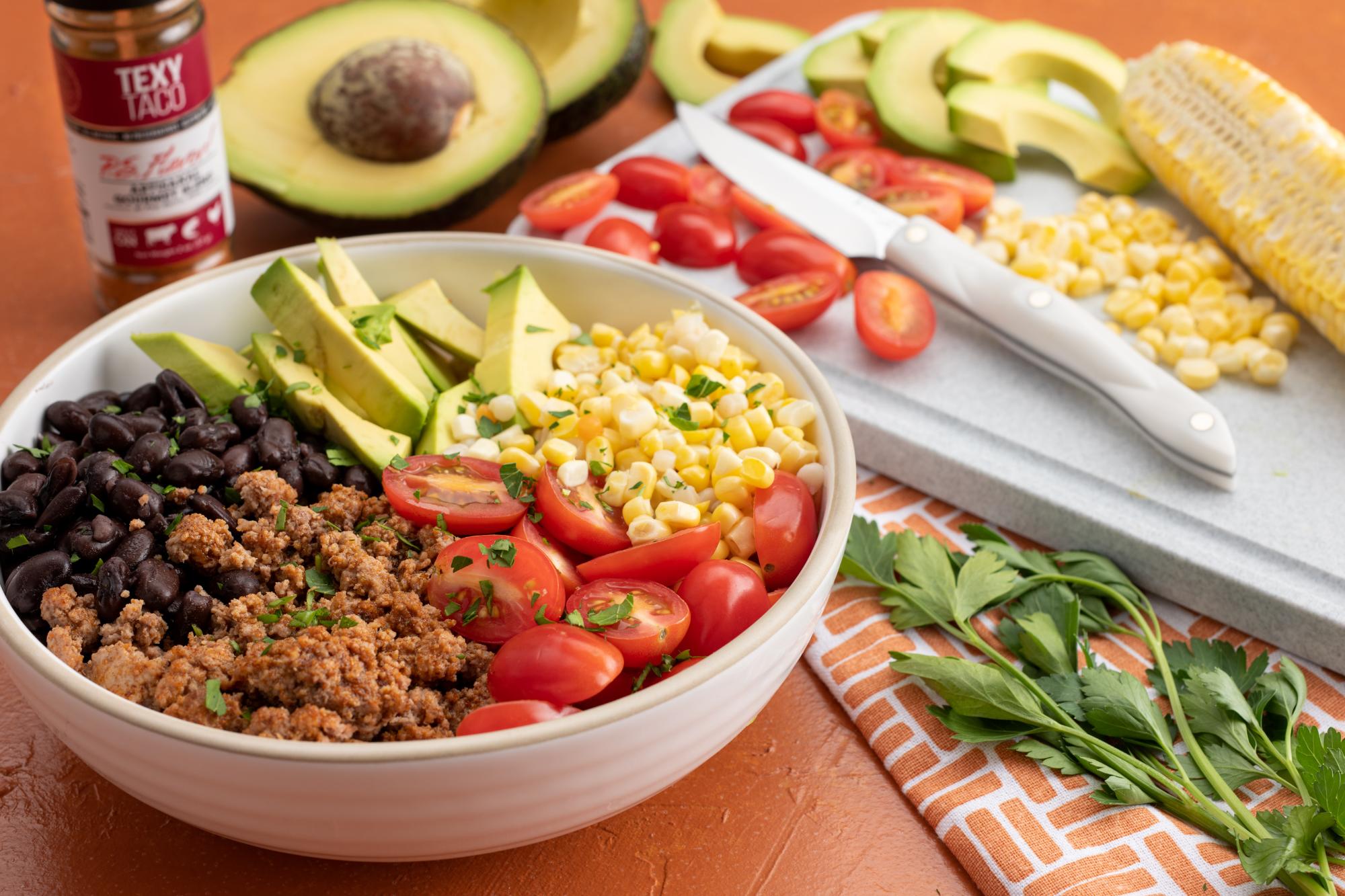 taco-bowl-with-couscous-ground-turkey-corn-and-avocados