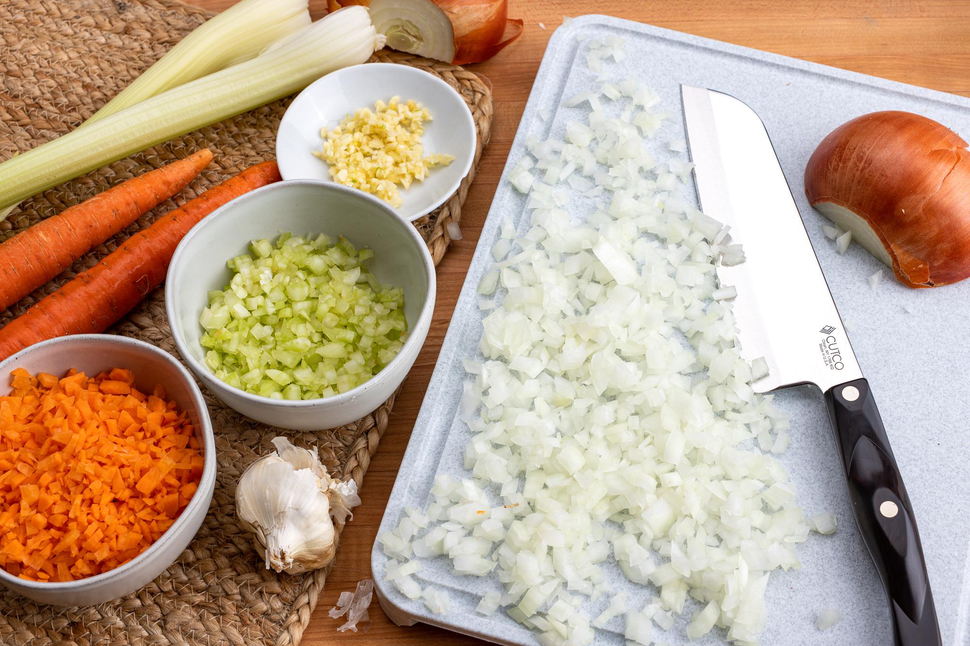 Prepped onion, celery and carrot with the Santoku.