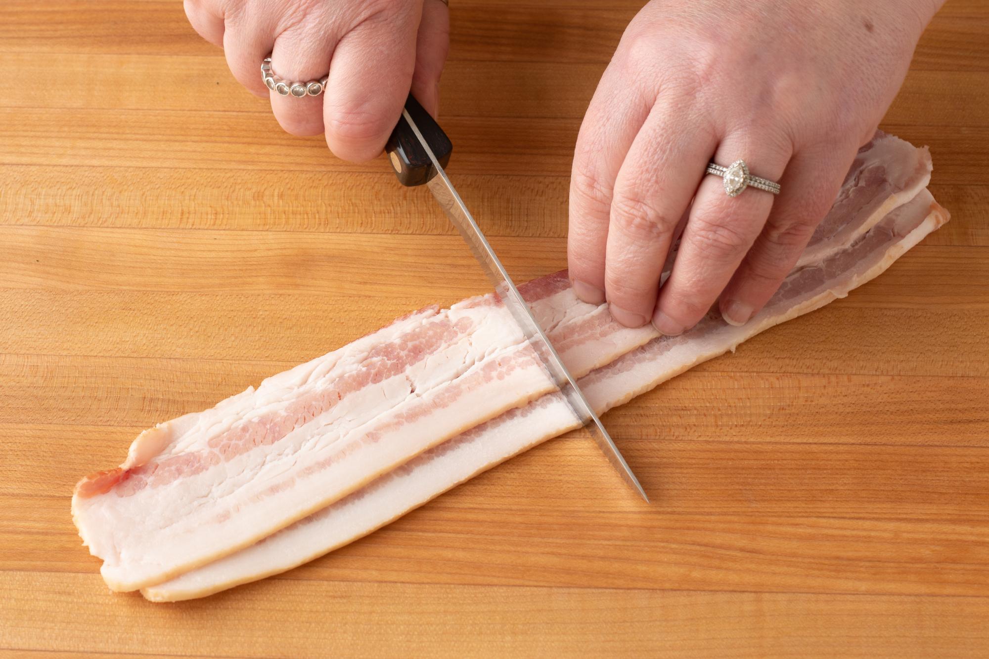 Cutting bacon in half with a Trimmer.