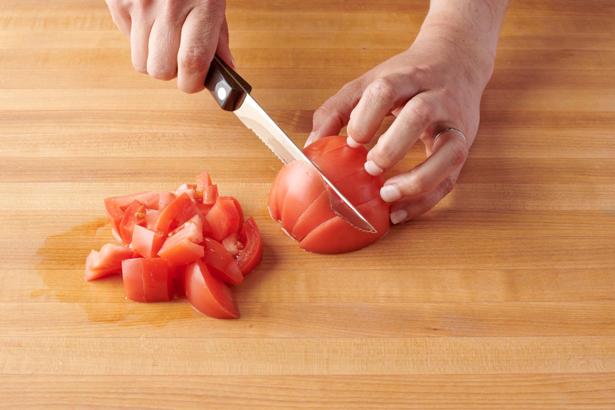 Chopping the tomatoes with a Trimmer.