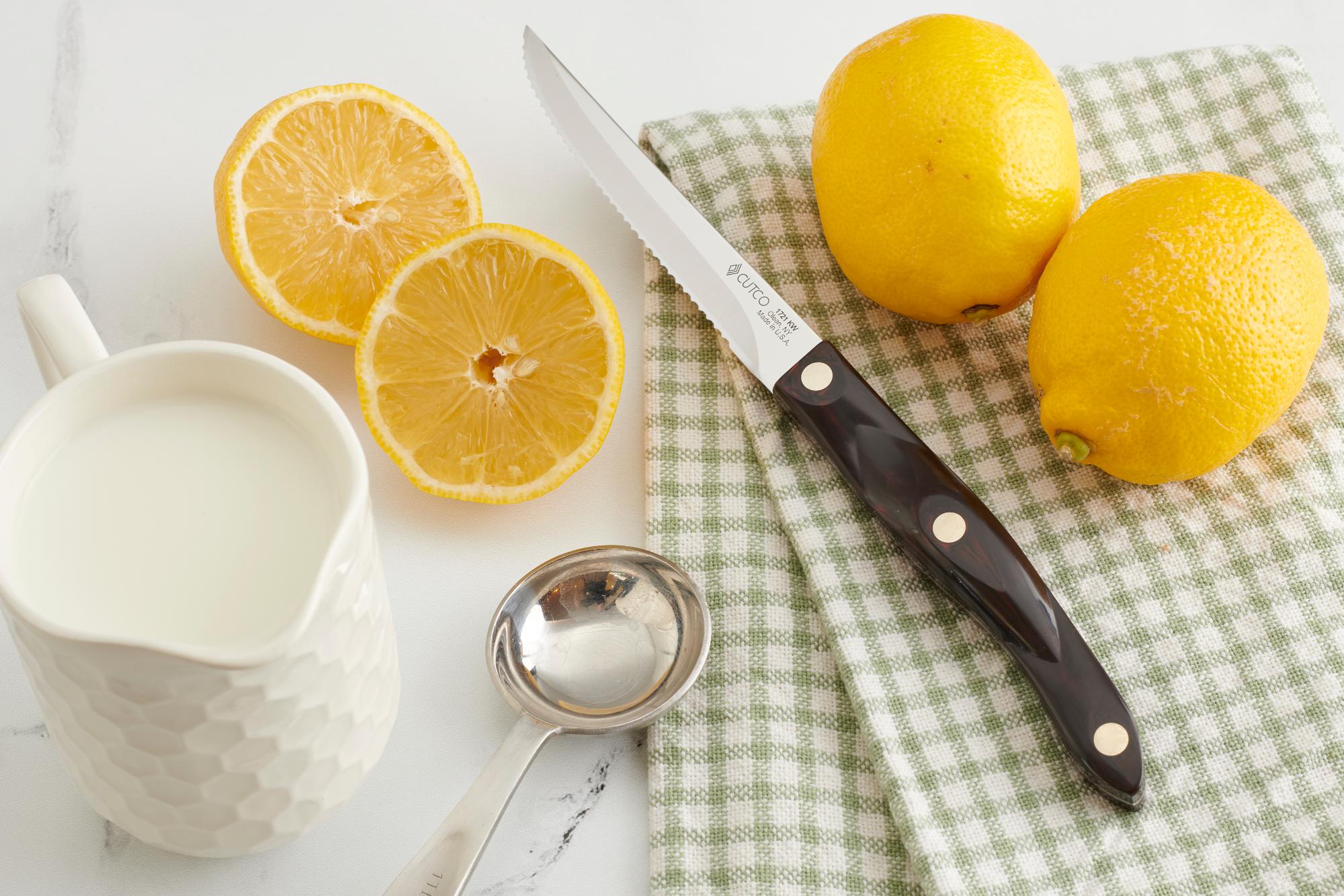 Trimmer with a halved lemon and milk.