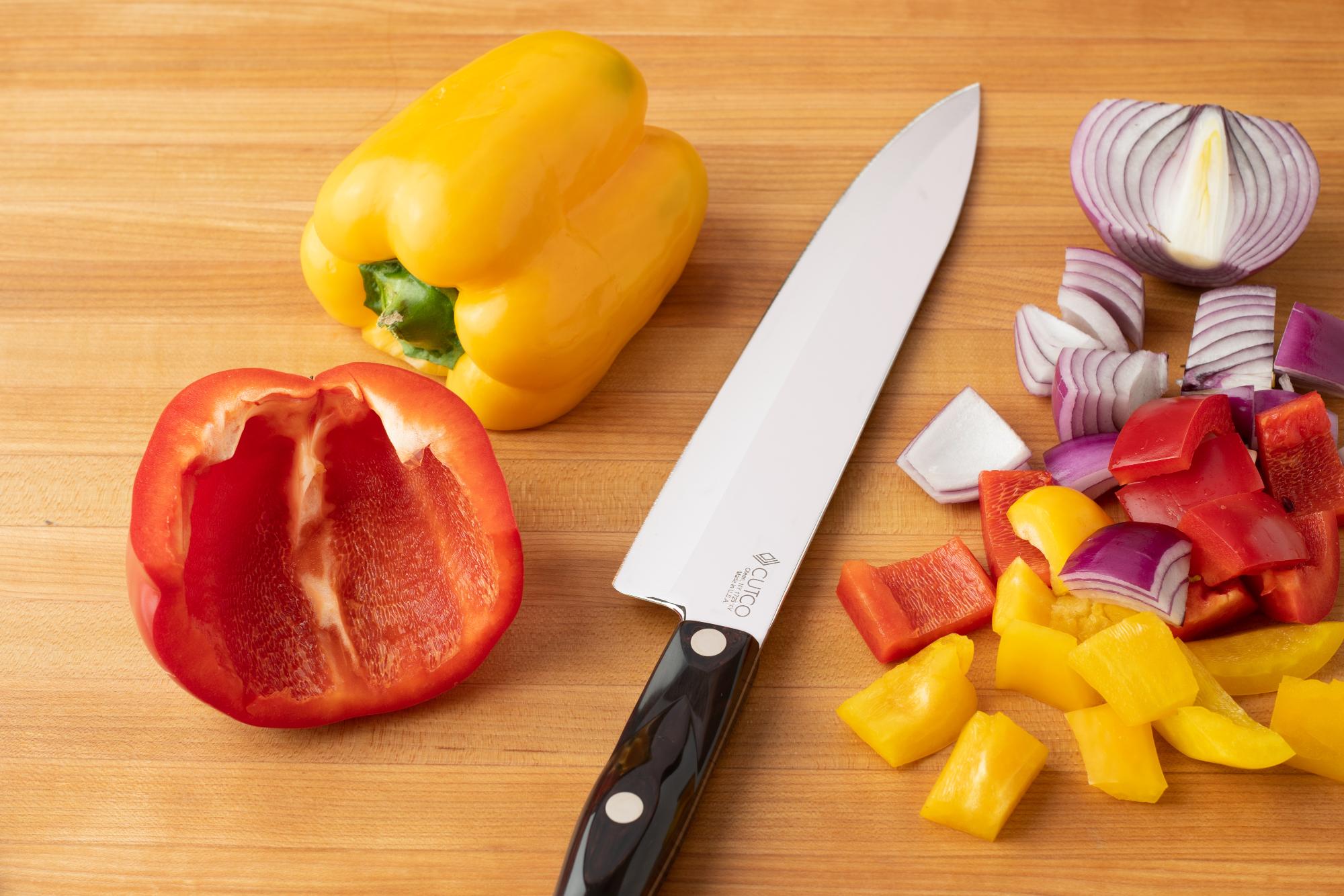 Chop the peppers and onions with a Petite Chef.