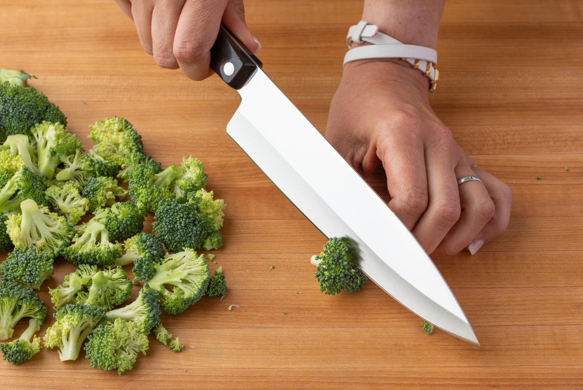 Cutting broccoli florets with a Petite Chef.