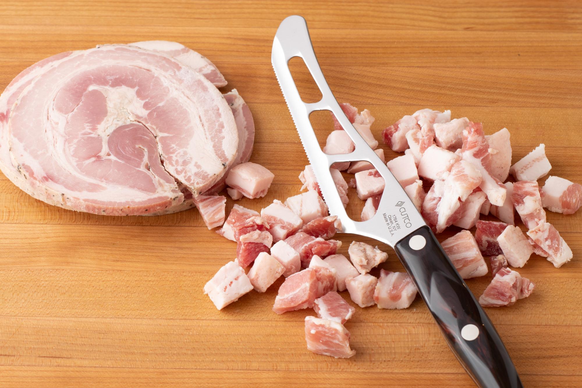 Dice the pancetta with a Traditional Cheese knife.