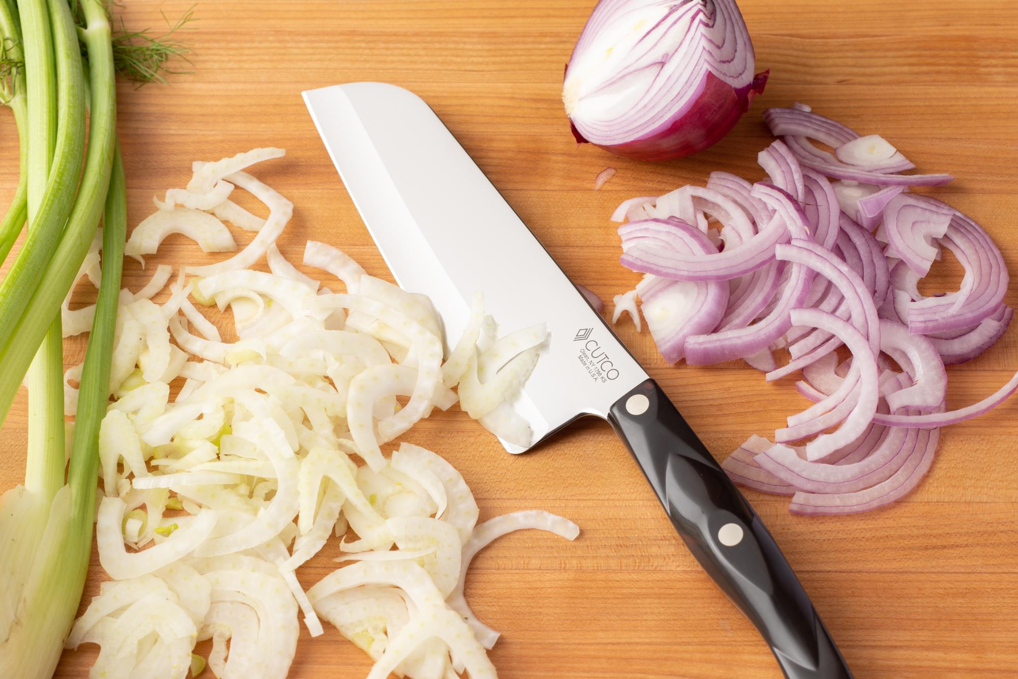 Using the Santoku to slice fennel and red onion.
