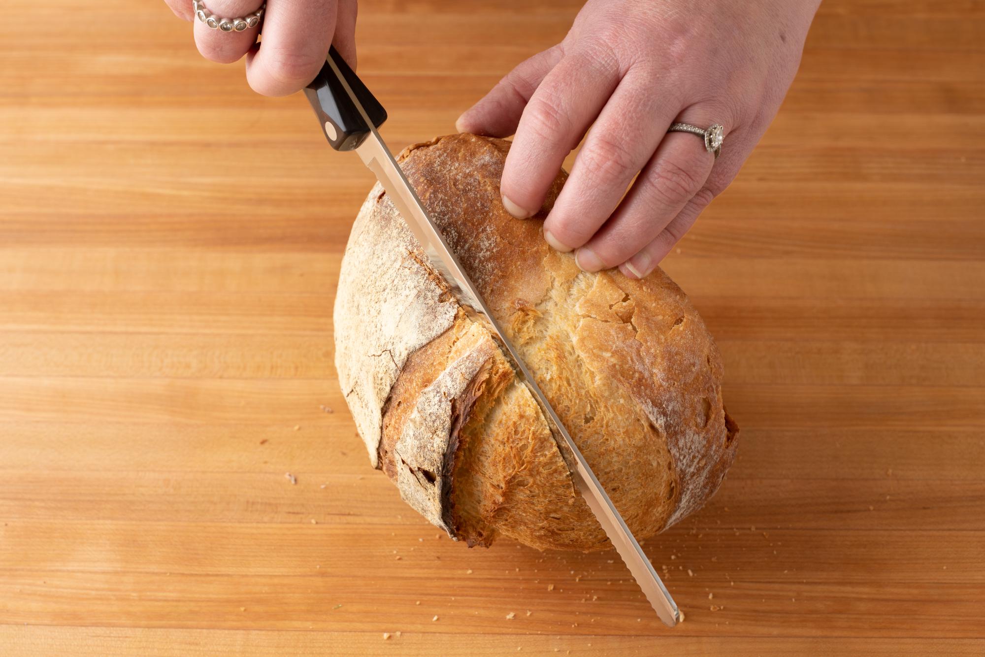 Slicing the bread with a Petite Slicer.