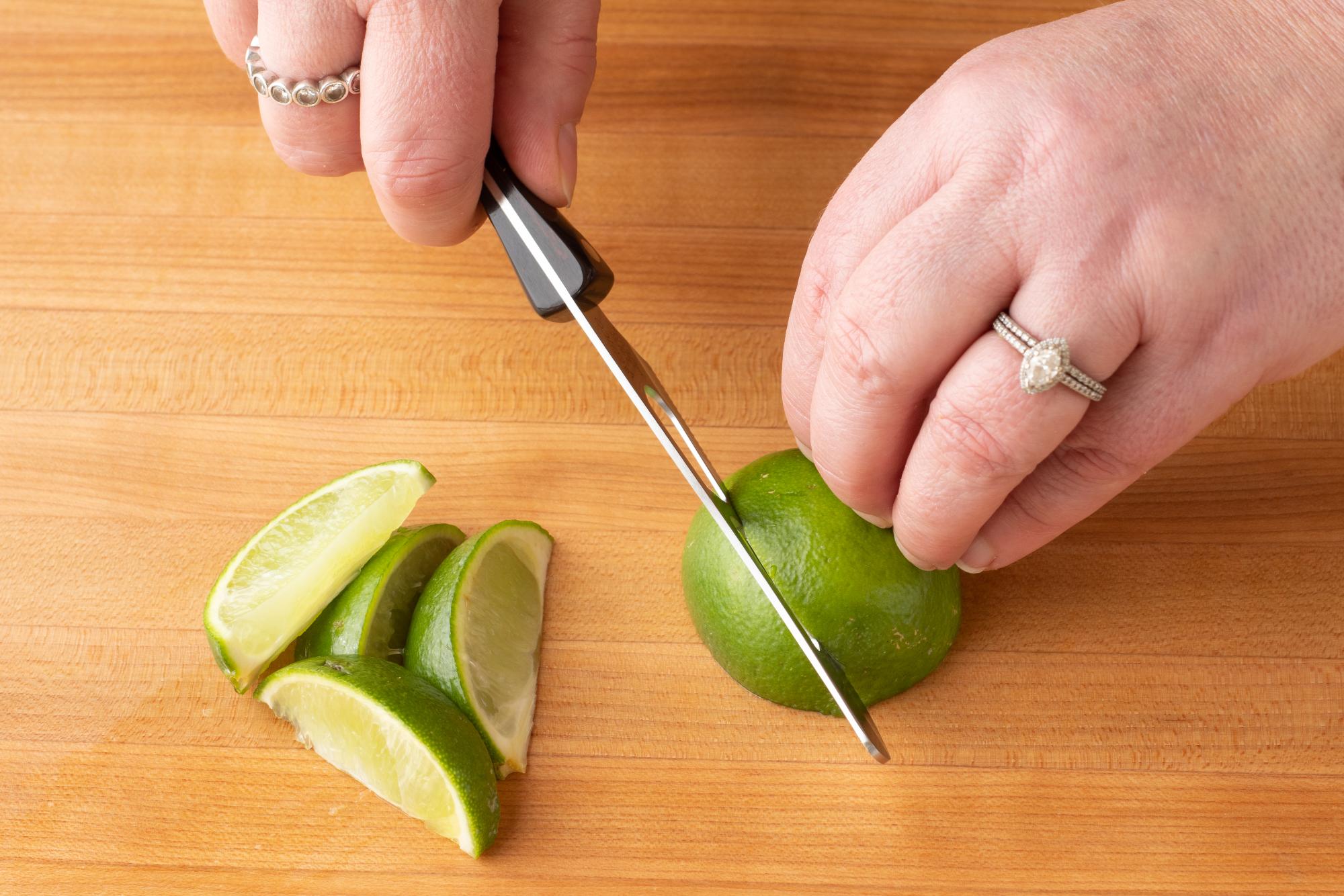 Cutting the lime with a Mini Cheese Knife.