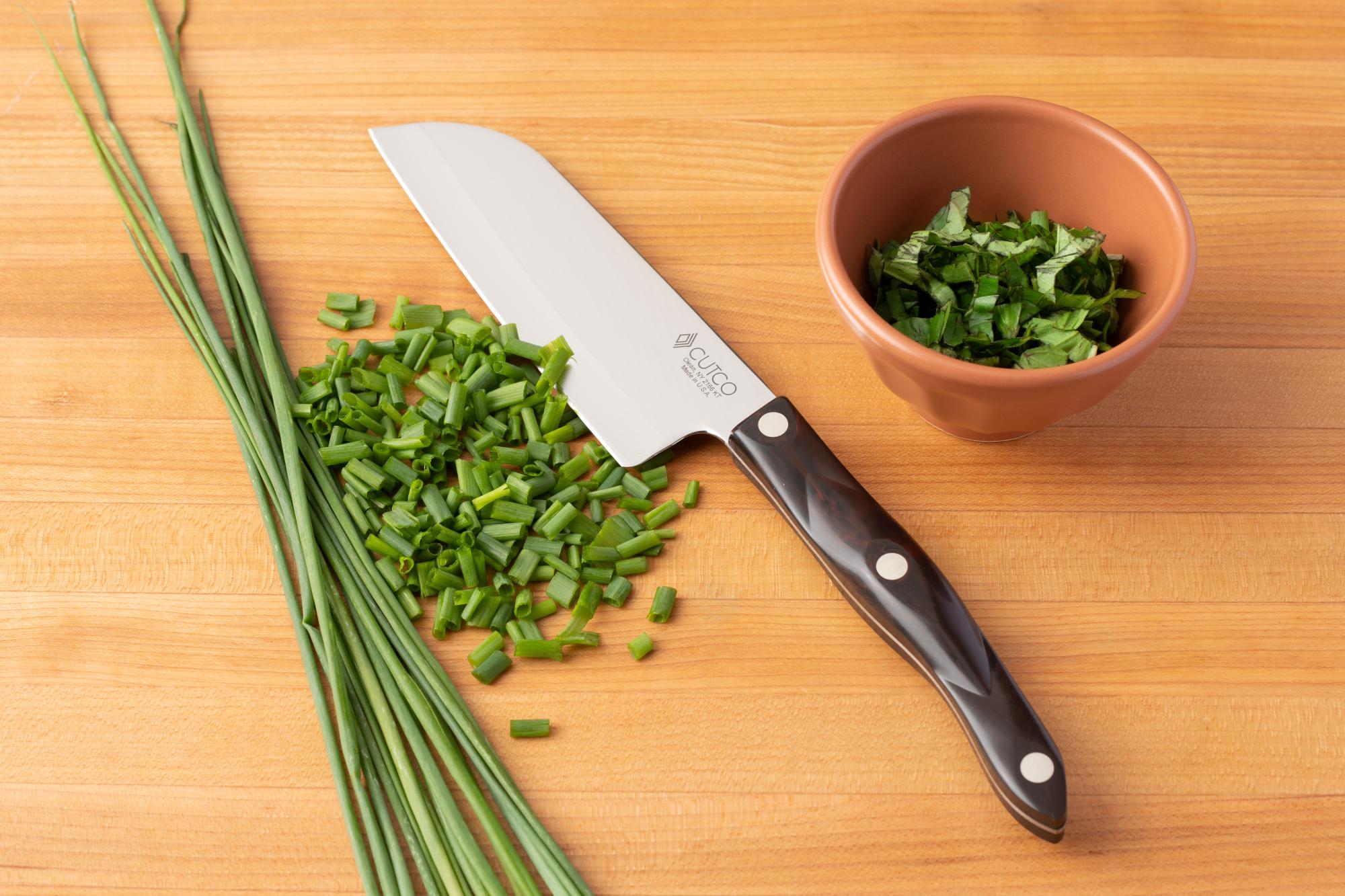 Use a Petite Santoku to roughly chop the chives and mint.