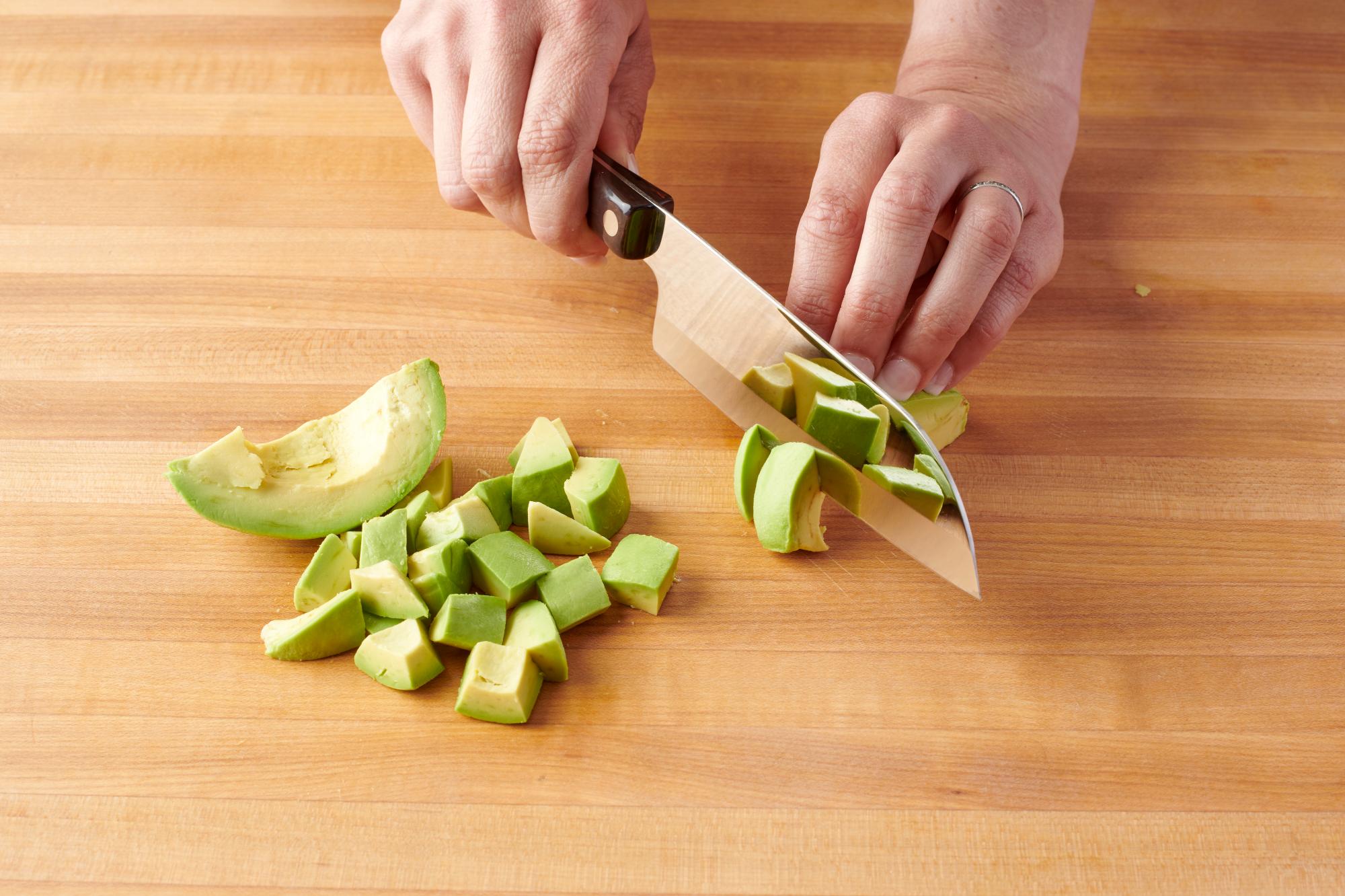 Preparing the avocado with a Petite Santoku.