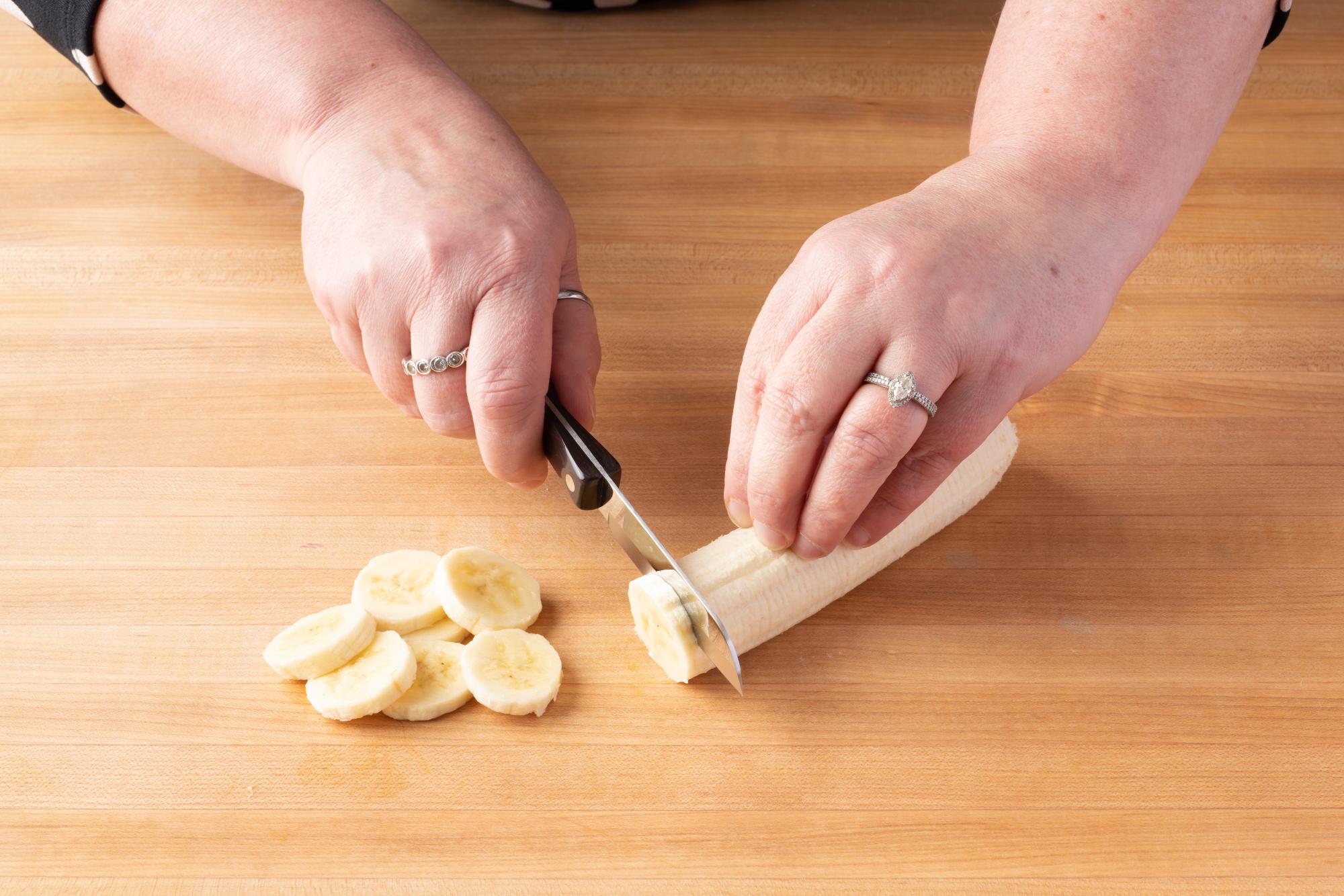 Slicing the banana with a Santoku-Style Paring knife.