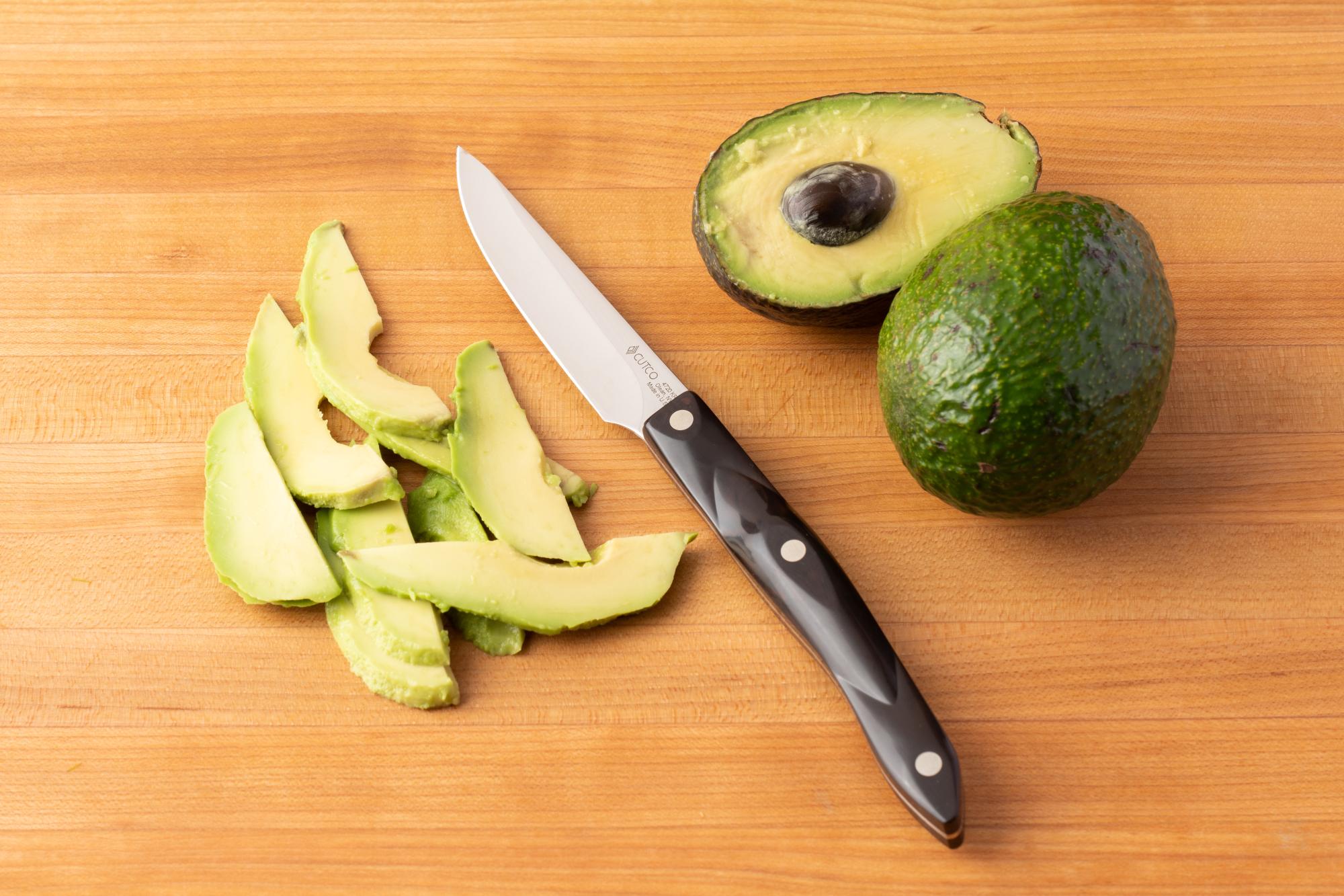 Slice the avocado with a 4 Inch Gourmet Paring Knife.