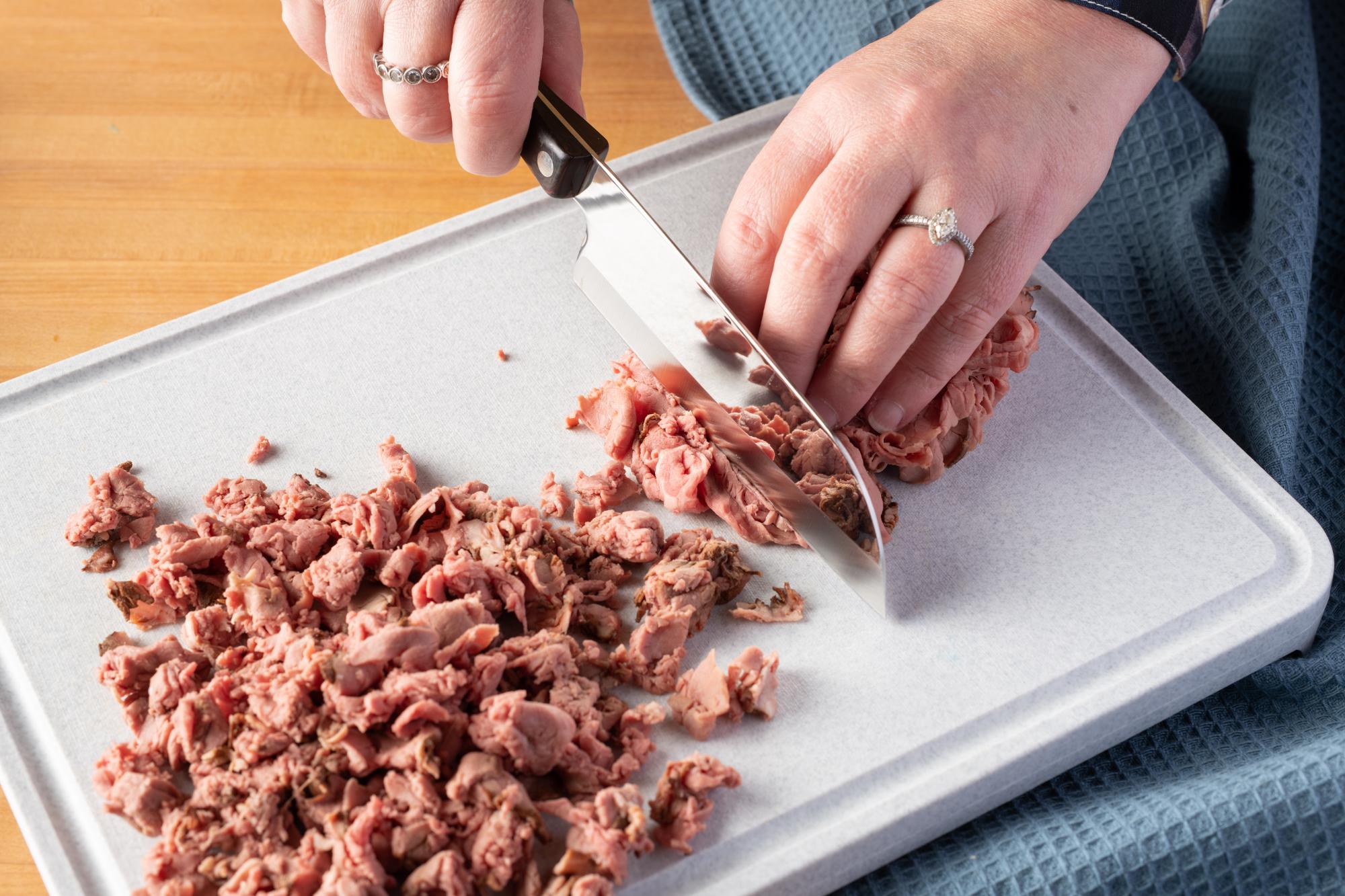 Chop the beef with a Petite Santoku.