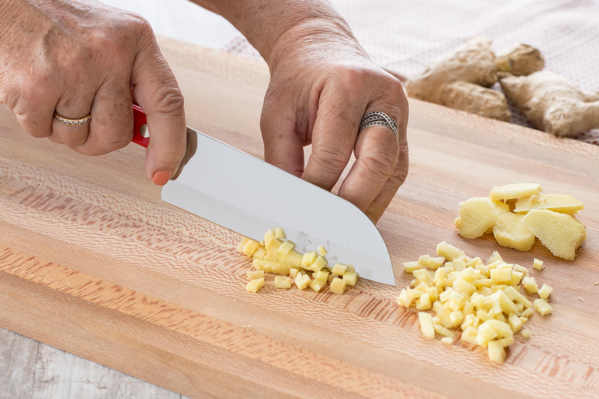 Mincing the ginger with a Petite Santoku.